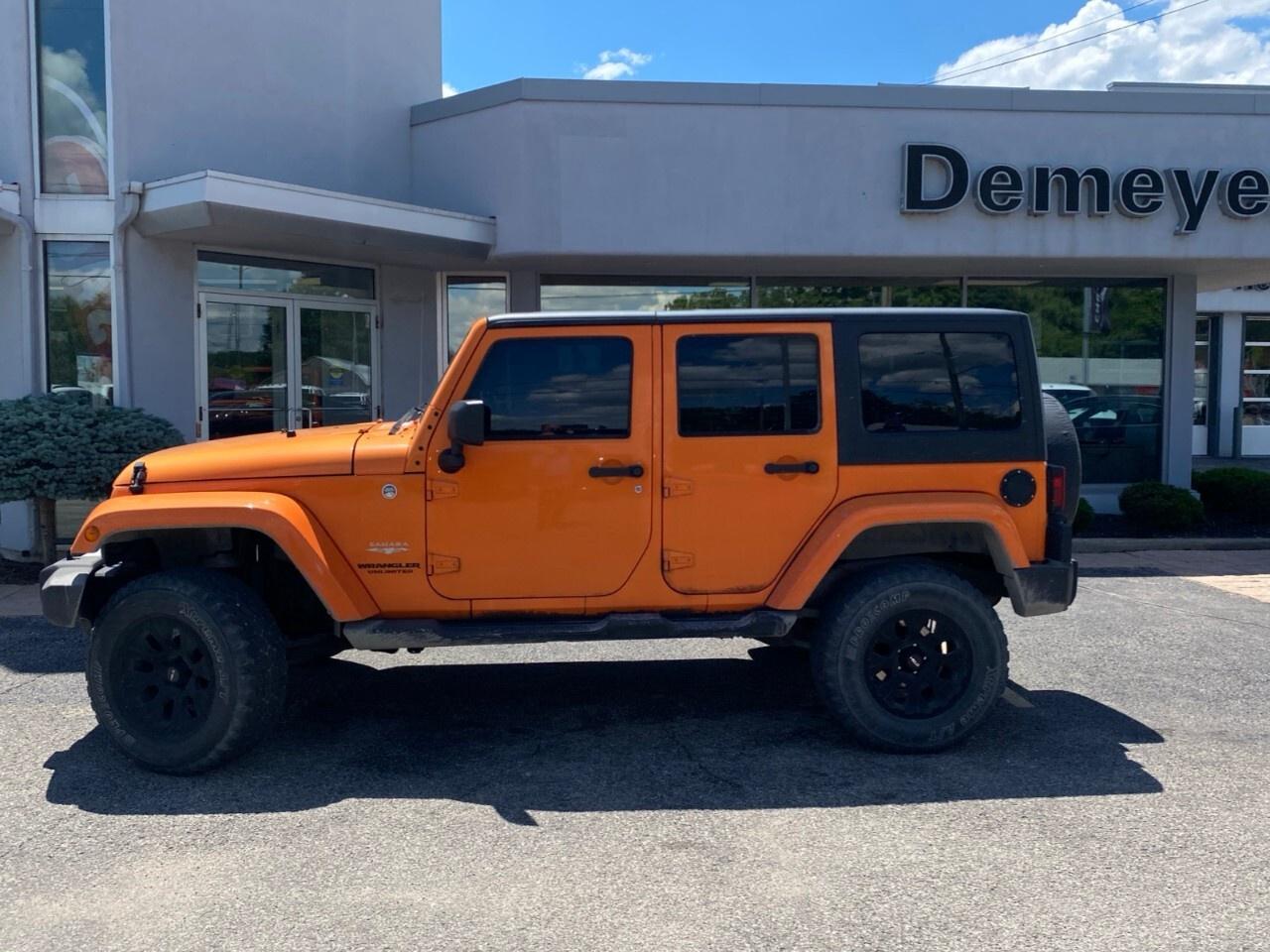 2012 Jeep WRANGLER UNLIMITED 4WD 4dr Sahara Photo