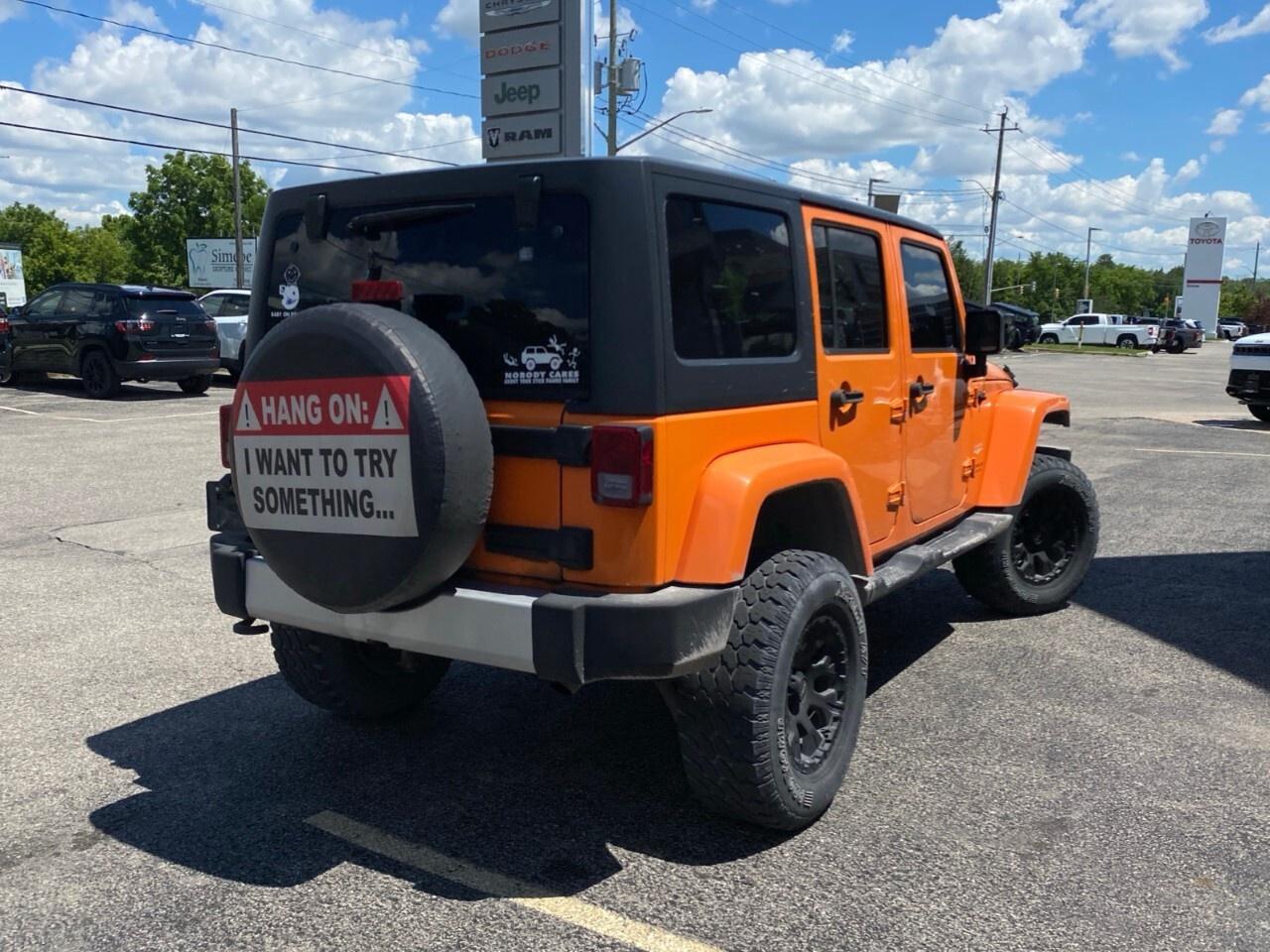 2012 Jeep WRANGLER UNLIMITED 4WD 4dr Sahara Photo