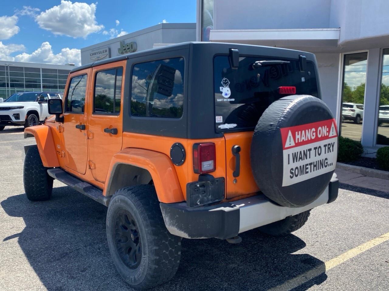 2012 Jeep WRANGLER UNLIMITED 4WD 4dr Sahara Photo2
