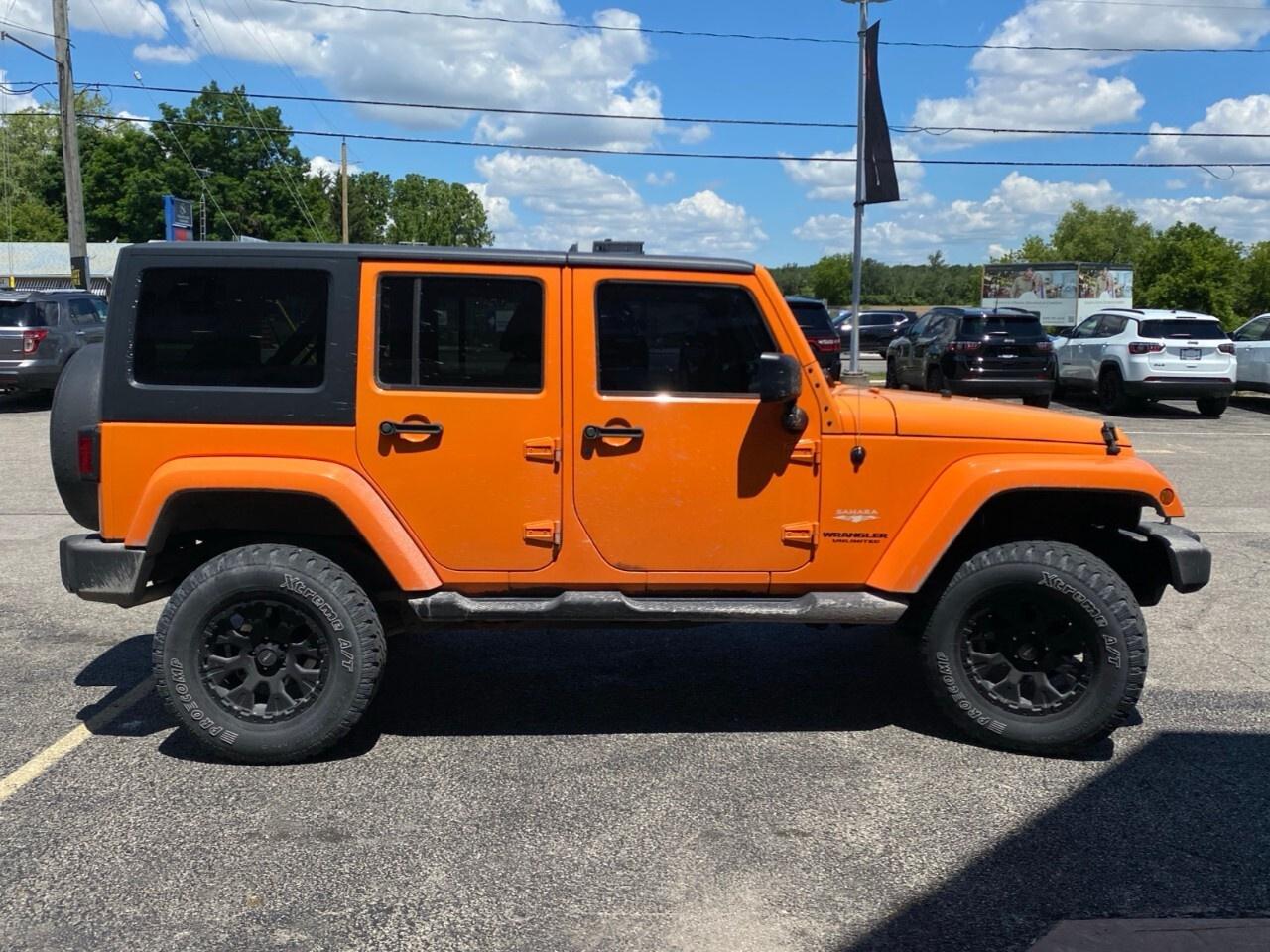 2012 Jeep WRANGLER UNLIMITED 4WD 4dr Sahara Photo