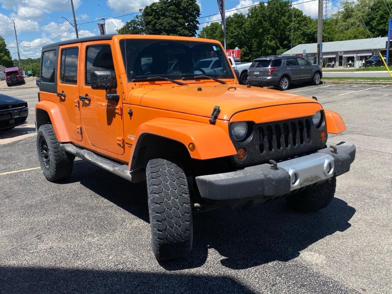 2012 Jeep WRANGLER UNLIMITED 4WD 4dr Sahara Photo