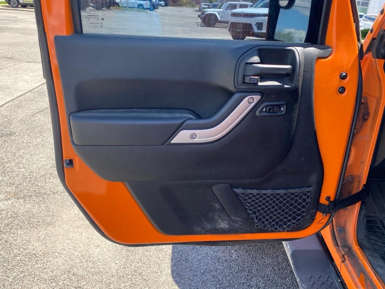 2012 Jeep WRANGLER UNLIMITED 4WD 4dr Sahara Photo