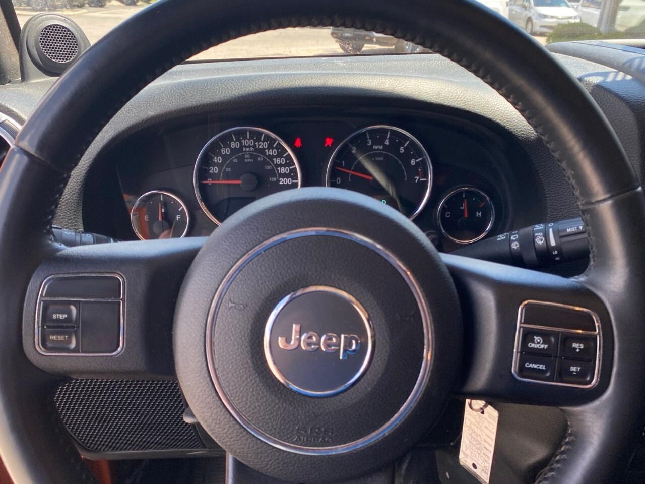 2012 Jeep WRANGLER UNLIMITED 4WD 4dr Sahara Photo