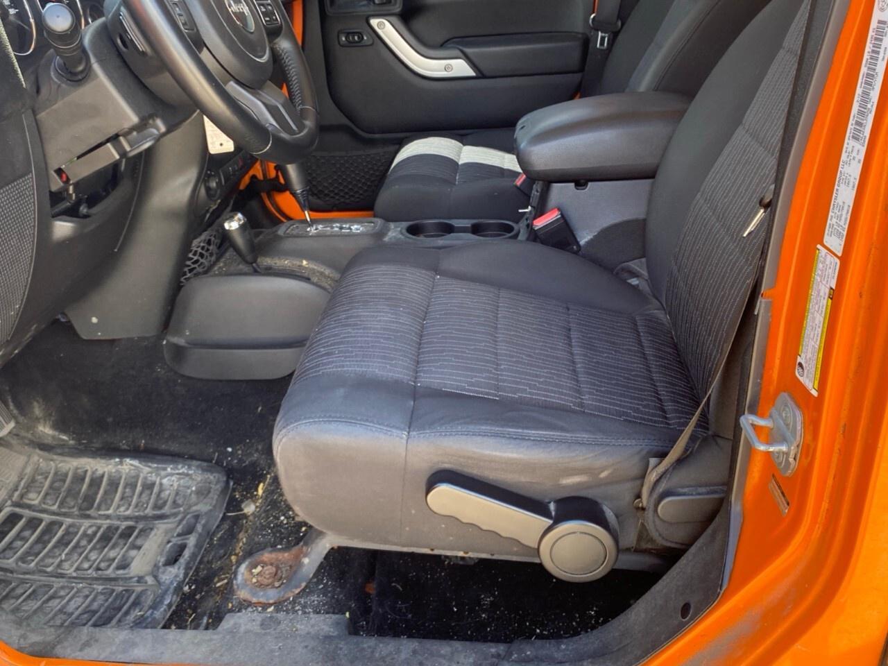 2012 Jeep WRANGLER UNLIMITED 4WD 4dr Sahara Photo