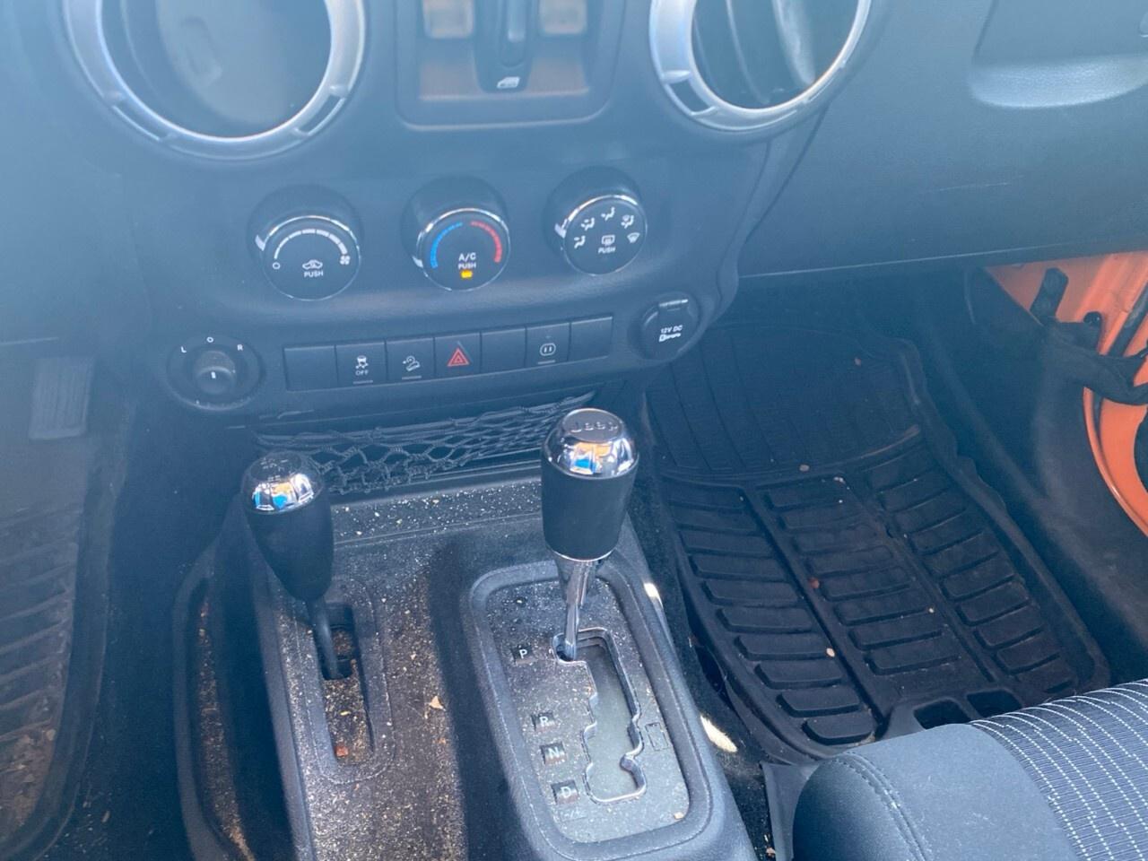 2012 Jeep WRANGLER UNLIMITED 4WD 4dr Sahara Photo