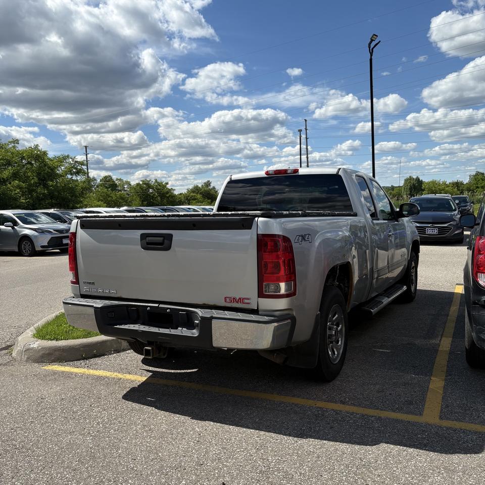 2011 GMC Sierra 1500 4WD Ext Cab 143.5  SL Nevada Edition   AS IS Photo