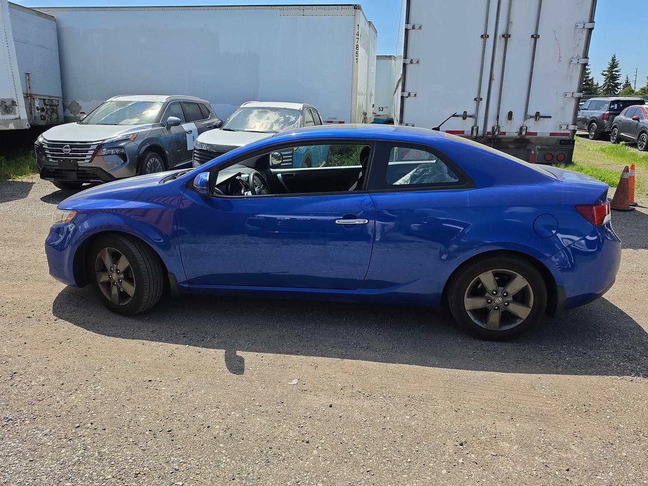 2011 Kia Forte Koup EX - LOW KM, AUTO, HEATED SEATS, A/C, BLUETOOTH! Photo