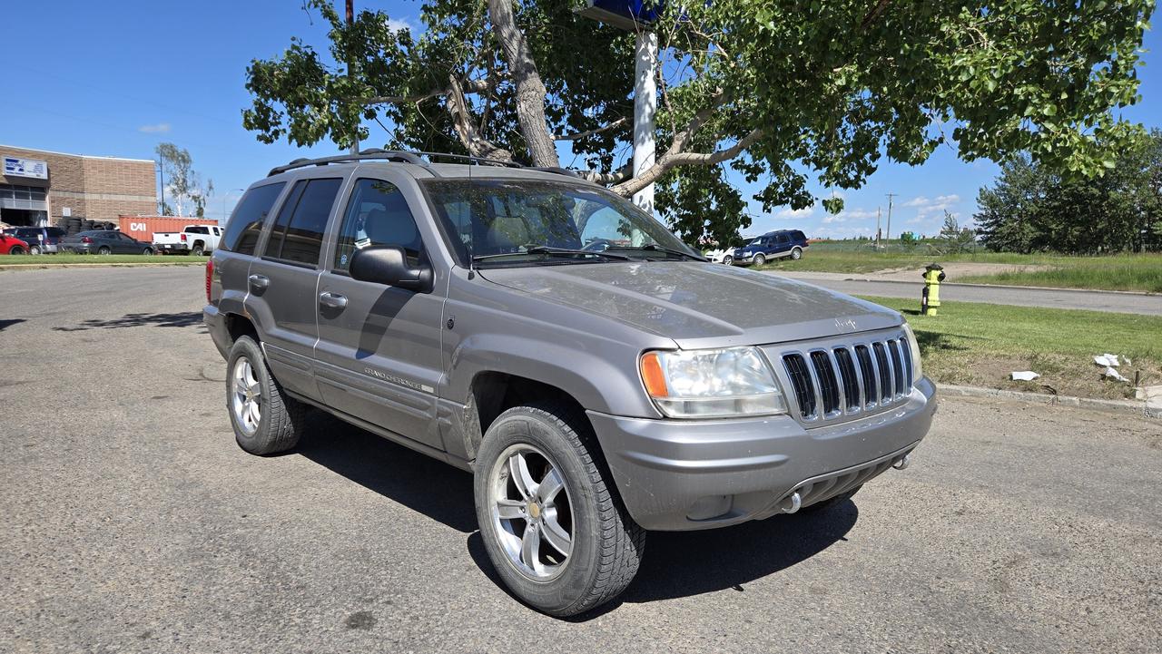 <p>2001 Jeep Grand Cherokee Limited &ndash; 4.7L V8 4WD<br>Reliable &bull; Capable &bull; Adventure-Ready SUV</p><p>💲 Price: $2800.00 + GST<br>📍 5701 - 17 AVE SE, CALGARY AB T2A0W3<br>📊 Mileage: 241,803 KM<br>🆔 Stock #: 0608</p><p>Looking for a powerful and capable SUV at an unbeatable price? This 2001 Jeep Grand Cherokee Limited is built for Calgary winters and everything in between &mdash; a true V8 4WD workhorse with premium trim!</p><p>✅ Features:<br>&bull; 4.7L V8 Engine &ndash; serious power & towing capability<br>&bull; Four-Wheel Drive (4WD) &ndash; ready for any road or weather<br>&bull; Limited Trim &ndash; premium comfort inside and out<br>&bull; Leather interior seating<br>&bull; Toyo Celsius All-Weather Tires &ndash; drive confidently year-round 🔥❄️<br>&bull; Power windows & locks<br>&bull; Cruise control<br>&bull; Air conditioning & heat<br>&bull; Spacious cargo area<br>&bull; Runs and drives well</p><p>✔ Comes With:<br>&bull; Mechanical Fitness Assessment<br>&bull; Insurance Inspection<br>&bull; FREE Carfax Report</p><p>📞 Text: (403) 971-9713<br>📞 Call or Text: (403) 613-2276<br>☎ Office: (403) 248-4881 (8am&ndash;5pm)</p><p>JJ Auto Sales & Services<br>Message us now to book your test drive! 🚙</p>