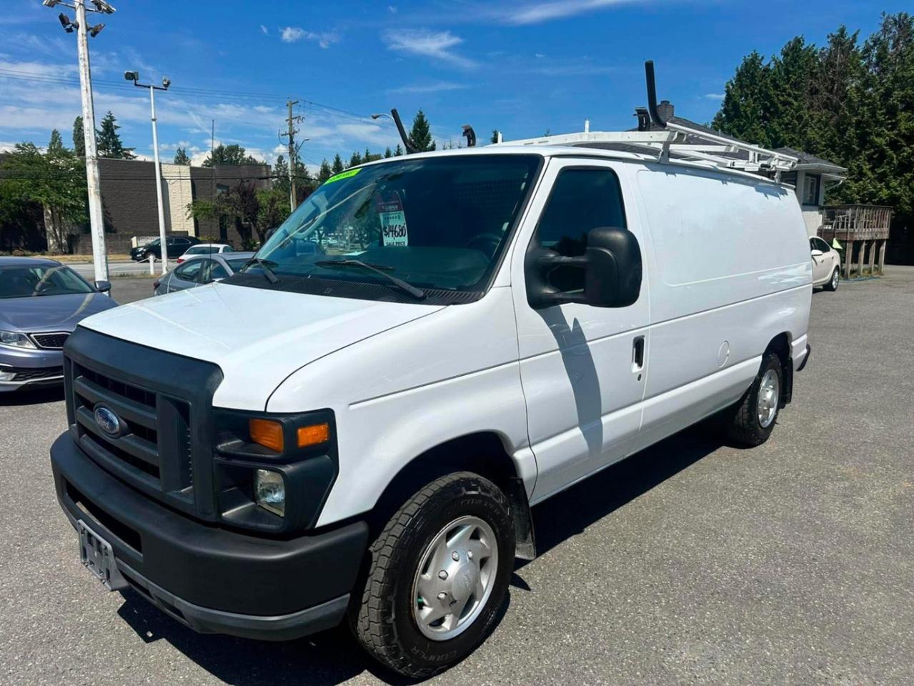 <p class=isSelectedEnd><span> </span><strong><span>2014 Ford E150 Cargo Van  Ready to Work!</span></strong><span> </span></p><p class=isSelectedEnd><span> Only </span><strong><span>129,723 KM</span></strong><br><span> Automatic Transmission</span><br><span> Air Conditioning </span><br><span> Cruise Control</span><br><span> Tilt Steering</span><br><span> 2 Passenger Seating</span><br><span> Safety Partition</span><br><span> Headache Rack</span><br><span> Centre Locking Storage Cabinet</span><br><span> Aluminum Storage Shelves</span><br><span> Roof Ladder Rack</span></p><p class=isSelectedEnd><span>This van is in </span><strong><span>very good condition</span></strong><span> and is fully set up for contractors, electricians, plumbers, or any mobile business. Reliable, organized, and work-ready!</span></p><p class=isSelectedEnd><span>Priced to Sell  Message for more details or to book a viewing!</span></p><p class=isSelectedEnd><span>Administration Fee $450</span></p><p><span>Dealer# 26220</span></p><span id=jodit-selection_marker_1782341875792_7321916912805158 data-jodit-selection_marker=start style=line-height: 0; display: none;></span> <p><br></p><p>Excellent, Affordable Lubrico Warranty Options Available on ALL Vehicles!</p><p><span style=background-color: rgba(var(--bs-white-rgb),var(--bs-bg-opacity)); color: var(--bs-body-color); font-family: open-sans, -apple-system, BlinkMacSystemFont, "Segoe UI", Roboto, Oxygen, Ubuntu, Cantarell, "Fira Sans", "Droid Sans", "Helvetica Neue", sans-serif; font-size: var(--bs-body-font-size); font-weight: var(--bs-body-font-weight); text-align: var(--bs-body-text-align);>All Vehicles are Safety Inspected by a 3rd Party Inspection Service.&nbsp;</span><br><br>We speak English, French, German, Punjabi, Hindi and Urdu Language!&nbsp;</p><p><br>We are proud to have sold over 15,000 vehicles to our customers throughout B.C. from this same&nbsp;location in Surrey.<span id=jodit-selection_marker_1747949601815_3502933354387793 data-jodit-selection_marker=start style=line-height: 0; display: none;></span></p><p><br>What Makes Us Different? <br>All of our vehicles have been sent to us from new car dealerships. They are all trade-ins and we are a large remarketing centre for the lower mainland new car dealerships. We do not purchase vehicles at auctions or from private sales. <br> <br>Administration Fee of $450<br> <br>Disclaimer: <br>Vehicle options are inputted from a VIN decoder. As we make our best effort to ensure all details are accurate we can not guarantee the information that is decoded from the VIN. Please verify any options before purchasing the vehicle. <br> <br>B.C. Dealers Trade-In Centre <br>14458 104th Ave. <br>Surrey, BC <br>V3R1L9 <br>DL# 26220</p><p> <br> </p><p>6-0-4-5-8-5-1-8-3-1</p>