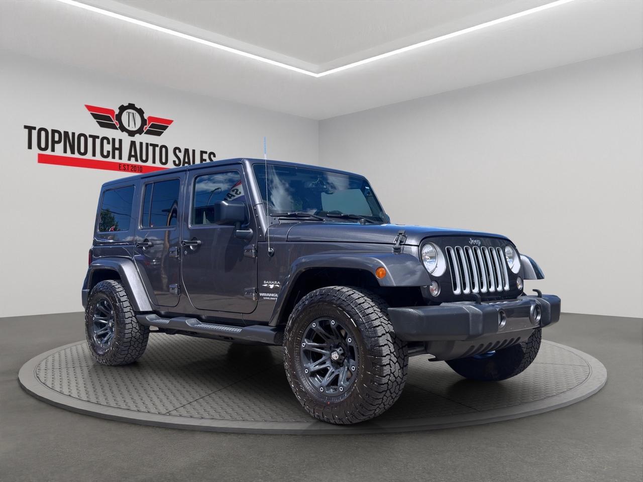 2017 Jeep Wrangler Unlimited Sahara 4x4 3.6L V6-Command-Trac4WD System/Leather-Trimmed Seats/Navigation/ Alpine Premium Audio/Power Convenience Group Photo2