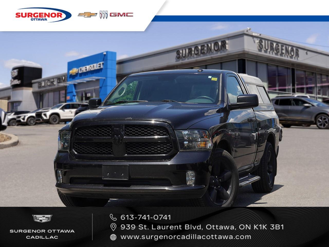<p>The 2016 Ram 1500 Express, in a striking black hue with a smooth rear-wheel-drive system, ensures an effortlessly controlled drive. This truck impresses with its powerful stance and robust styling, highlighted by the expressive black exterior accented with the BLACK package to create a bold visual statement. Inside, the matching black interior provides a refined environment suited to any journey.</p><p>Technology and safety are key components of this Ram model, offering air conditioning for comfort, brake assist for enhanced safety, and cruise control for easy highway travel. With its 5.7L 8-Cylinder engine delivering an impressive 395 horsepower at 5600 RPM, this truck is designed to perform under any driving conditions.</p><p>This Ram 1500 is ideal for drivers seeking a dependable and stylish vehicle for work or leisure. If you're ready to make a powerful addition to your daily drive, contact Surgenor Chevrolet Buick GMC Cadillac for more details on how this truck can meet your needs.</p>