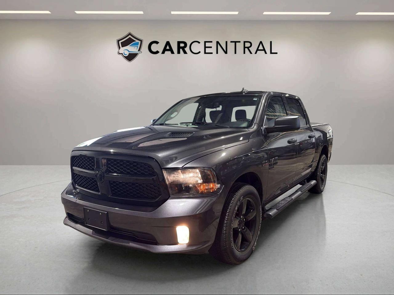 Express, 5.7L HEMI V8, 4x4, Crew Cab, Remote Start, Trailer Tow Group

Built for the driver who needs real capability without compromise, the RAM 1500 Classic Express delivers a rugged, purposeful experience that feels at home whether youre hauling, towing, or simply commanding the road. The 5.7L HEMI V8 produces a signature exhaust note and effortless power that makes every load feel lighter and every merge feel confident. In a class full of half-measures, this truck is the genuine article.

Available now at Car Central &mdash; Barries largest used car dealership and the most trusted in Simcoe County. Rated 4.9 stars on Google with over 1,200 five-star reviews, weve earned our reputation by making car buying simple, best price upfront, no haggling, no pressure. With 200+ vehicles in stock and a team that puts you first, come see why more people choose Car Central than anywhere else in the region.

CARFAX: Free Carfax report on all our listing. Just go on our website and click view Carfax report.


CERTIFICATION: Have your new pre-owned vehicle certified at Car Central! We offer a full safety inspection exceeding industry standards including oil change, and professional detailing prior to delivery. Vehicles are not drivable, if not certified and not e-tested, certification package is available for $749. All trade-ins are welcome. Taxes, licensing are extra.


PRICE: We believe everyone deserves to get the best price possible on their new pre-owned vehicle without having to go through uncomfortable negotiations. Our Market Value Pricing (MVP) allows you to buy with confidence. We do this by constantly monitoring the market and adjusting our prices below the market average you can buy confidently knowing you are getting the best price possible! No haggle pricing. No pressure. Why pay more somewhere else. **CASH PRICE** will be an additional $1750 and it will include 1 Year or 15,000 kms Powertrain warranty. 


SERVICE: Schedule an appointment with Car Central Service Centre to bring your vehicle in for all its needs. Simply click on the link below and book your appointment. Our licensed technicians and repair facility offer the highest quality services at the most competitive prices. All work is manufacturer warranty approved and comes with 2-year parts and labour warranty. Start saving hundreds of dollars by servicing your vehicle with Car Central. Call us at 705-503-5000 or follow this link to book an appointment today! https://www.carcentral.ca/contact-us/


WARRANTY: This vehicle qualifies for an extended warranty with different terms and coverages available. Dont forget to ask for help choosing the right one for you.


FINANCING: No credit? New to the country? Bankruptcy? Consumer proposal? Collections? You dont need good credit to finance a vehicle. Bad credit is usually good enough. Give our finance and credit experts a chance to get you approved and start rebuilding credit today! On the spot financing, instant approvals, and no payments for 6 months is also available O.A.C!


Any vehicle stock number starting with Letter R are Previous daily Rental.


With over 30 years of experience, Car Central is a proud family-owned business and a trusted member of the UCDA. Our mission is to offer not only the best prices but also high-quality, reliable vehicles and an exceptional customer experience. We believe in making your car buying journey stress-free, with absolutely no pressurejust honest service you can rely on."