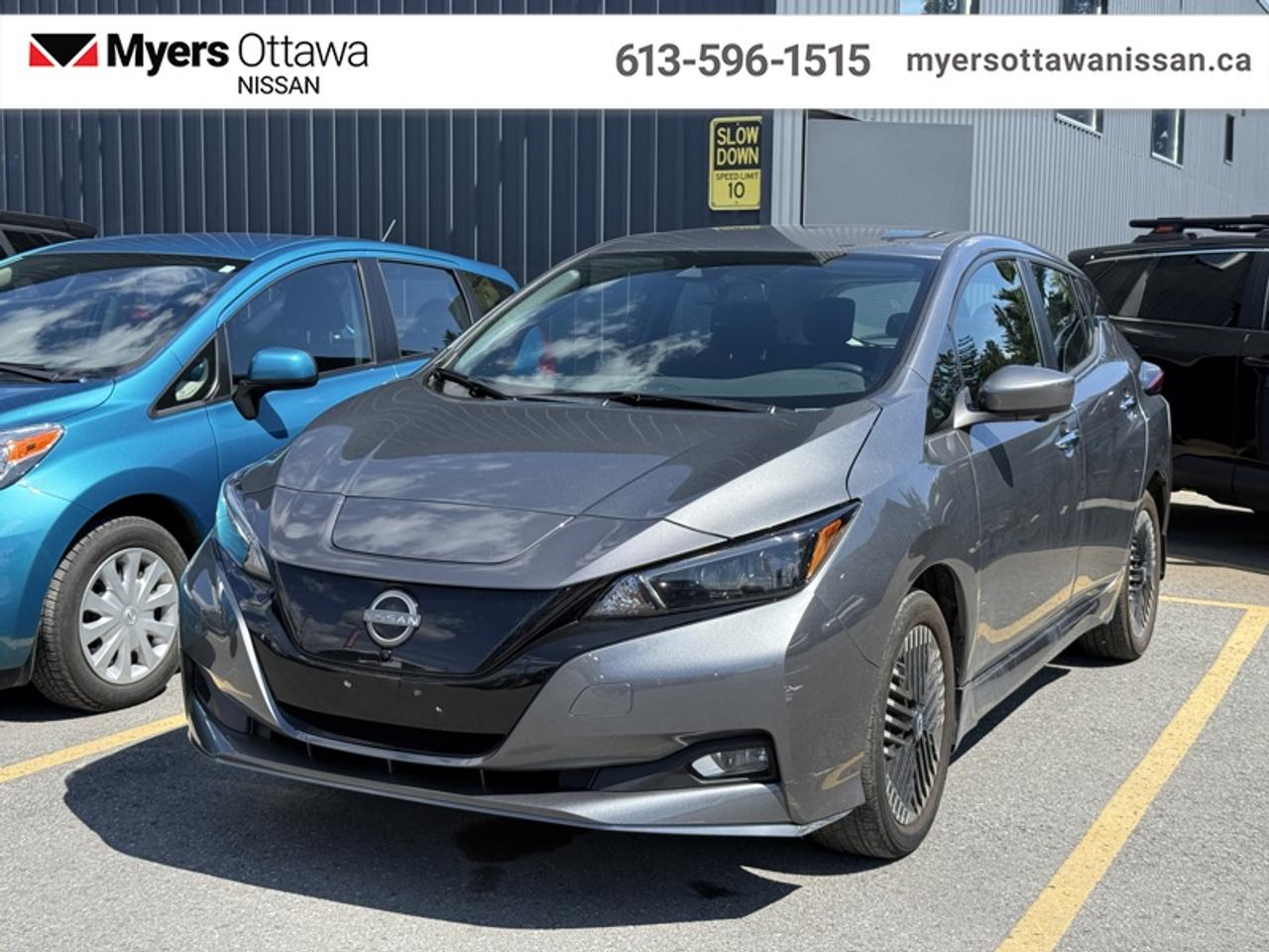 <b>Low Mileage, Electric Vehicle,  Navigation,  Apple CarPlay,  Android Auto,  Lane Keep Assist!</b><br> <br>  Compare at $24995 - Our Price is just $22595! <br> <br>Feel the rush in this 2023 Nissan Leaf with impressive performance and no gas bill. This 2023 Nissan LEAF is fresh on our lot in Ottawa.<br> <br>Bold lines and distinctive touches throughout the cabin of this 2023 Nissan Leaf prove that electric driving was always meant to be exciting. A simply amazing experience like no other, this 2023 Nissan Leaf lets you enjoy pure driving joy, and at the flip of a switch will give you the freedom to enjoy a scenic ride with confident active safety features. Never sacrifice comfort, convenience, or fun again with this 2023 Nissan Leaf.<br> <br>This low mileage hatchback has just 12,649 km. Its Grey in colour. It has an Automatic transmission and is powered by a smooth engine. <br> <br> Our LEAFs trim level is SV. This fully electric Leaf SV makes every trip better with enhanced connectivity features like NissanConnect EV with touchscreen and navigation, Apple CarPlay, and Android Auto. This roomy family hatch helps you drive with confidence thanks to a safety suite featuring collision mitigation, blind spot warning, lane keep assist, distance pacing with stop and go, and a 360 degree camera. Other great features include heated seats, a heated leather steering wheel, a proximity key and push button start, automatic air conditioning, alloy wheels, automatic LED lighting, and fog lamps. This vehicle has been upgraded with the following features: Electric Vehicle, Navigation, Apple CarPlay, Android Auto, Lane Keep Assist, Heated Seats, Blind Spot Detection.<br> <br>To apply right now for financing use this link: <a href=https://www.myersottawanissan.ca/finance target=_blank>https://www.myersottawanissan.ca/finance</a><br> <br/>Payments from <b>$363.42</b> monthly with $0 down for 84 months @ 8.99% APR O.A.C. ( Plus applicable taxes - and licensing fees ). See dealer for details. <br><br>Get the amazing benefits of a Nissan Certified Pre-Owned vehicle!!! Save thousands of dollars and get a pre-owned vehicle that has factory warranty, 24 hour roadside assistance and rates as low as 2.99%!!! <br>*LIFETIME ENGINE TRANSMISSION WARRANTY NOT AVAILABLE ON VEHICLES WITH KMS EXCEEDING 140,000KM, VEHICLES 8 YEARS & OLDER, OR HIGHLINE BRAND VEHICLE(eg. BMW, INFINITI. CADILLAC, LEXUS...)<br> Come by and check out our fleet of 30+ used cars and trucks and 130+ new cars and trucks for sale in Ottawa.  o~o