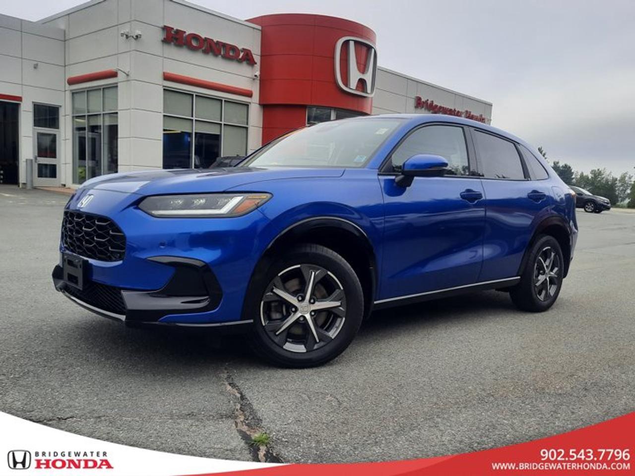 2024 Honda HR-V EX-L AWD Premium Comfort, All-Weather Confidence & Ready for Your Next AdventureLooking for a compact SUV that feels right at home in the city but is always ready to head out on your next adventure? This 2024 Honda HR-V EX-L AWD delivers premium comfort, advanced technology, and the confidence of Hondas Real Time AWD system, making it an excellent choice for drivers across Bridgewater, the South Shore, and throughout Nova Scotia.Whether youre commuting to work, exploring coastal roads, or packing up for a weekend getaway, the HR-V EX-L offers the versatility, fuel efficiency, and refined driving experience youve been looking for.Features Youll AppreciateSink into comfortable leather-trimmed seating that adds a premium feel to every drive.Keep warm during chilly Nova Scotia mornings with heated front seats and a heated steering wheel.Enjoy extra confidence in changing road conditions with Hondas Real Time AWD system.Stay connected with wireless Apple CarPlay® and Android Auto , making it easy to access navigation, music, and hands-free calls.Remote engine start lets you warm up or cool down the cabin before you even step inside.Blind Spot Information with Rear Cross Traffic Monitor helps make lane changes and backing out of parking spaces easier.Honda Sensing® safety technologies, including Adaptive Cruise Control, Collision Mitigation Braking System , Lane Keeping Assist, and Road Departure Mitigation, help you drive with confidence.Automatic climate control keeps the cabin comfortable no matter the season.LED headlights provide bright, clear visibility for nighttime driving.A power moonroof lets in fresh air and sunshine on every journey.Buy With Confidence at Bridgewater HondaEvery pre-owned vehicle at Bridgewater Honda includes:Fresh oil changeNova Scotia Motor Vehicle Inspection (MVI)Comprehensive safety inspectionProfessional interior and exterior detailCARFAX Vehicle History ReportFull tank of fuelThorough reconditioning completed by our factory-trained techniciansThis HR-V has been reconditioned with:Fresh oil changeBrake fluid serviceFront brake rotors machinedRear brake rotors servicedBrake maintenance completedFilter replacementWith no reported accidents on the CARFAX, you can enjoy added peace of mind every time you get behind the wheel.Steele CertifiedThis HR-V is Steele Certified, meaning it has passed a comprehensive inspection and includes additional certified benefits designed to provide extra confidence and value with your purchase.Financing Made EasyAt Bridgewater Honda, we offer financing solutions for every credit situation. Whether youre purchasing your first vehicle, rebuilding your credit, or upgrading to something newer, our finance specialists are here to help you find a payment that works for your budget.Why Buy from Bridgewater Honda?Bridgewater Honda is proud to serve customers throughout Bridgewater, the South Shore, and across Nova Scotia. Our team is committed to providing a transparent, stress-free buying experience backed by quality vehicles and exceptional customer service.This HR-V EX-L is ready for its next adventure. Wherever life takes you, youll enjoy outstanding comfort, advanced safety, and the reliability Honda is known for.Book your test drive today, reserve this HR-V online, or apply for financing with Bridgewater Hondayour trusted destination for Used Cars in Bridgewater and quality Used Honda vehicles in Nova Scotia.
