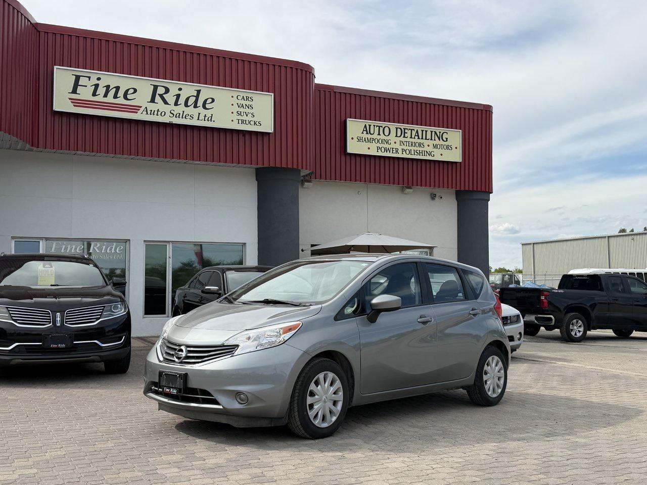 <p>2015 Nissan Versa Note SV Hatchback</p><p>1.6LTR 4cyl<br>ONLY 105,000kms!<br>A/C<br>Tilt<br>Cruise<br>Power windows<br>Power locks<br>Power mirrors<br>5 passengers<br>AM/FM radio<br>Bluetooth<br>Original Manitoba car with NO CLAIMS!<br>Back up camera<br>Steel wheels<br>Economical transportation!</p><p><strong>MORE PICTURES TO FOLLOW</strong></p><p>$11,975 Safetied<br>Financing and Warranty Available at Fine Ride Auto Sales Ltd<br>www.FineRideAutoSales.ca</p><p>Call: 204-415-3300 or 1-855-854-3300<br>Text: 204-226-1790<br>View in person at: Unit 3-3000 Main Street</p><p>DLR# 4614<br>**Plus applicable taxes**</p><p></p><p style=text-align:center;><span style=color:#000000;><i><span style=font-family:book antiqua, palatino, serif;font-size:14pt;><strong>***NEW SUMMER HOURS EFFECTIVE MAY 15, 2026***</strong></span></i></span></p><p style=text-align:center;><span style=color:#000000;><span style=font-family:book antiqua, palatino, serif;font-size:14pt;>Monday                9am to 6pm</span></span><br><span style=color:#000000;><span style=font-family:book antiqua, palatino, serif;font-size:14pt;>Tuesday               9am to 6pm</span></span><br><span style=color:#000000;><span style=font-family:book antiqua, palatino, serif;font-size:14pt;>Wednesday               9am to 8pm</span></span><br><span style=color:#000000;><span style=font-family:book antiqua, palatino, serif;font-size:14pt;>Thursday                9am to 6pm</span></span><br><span style=color:#000000;><span style=font-family:book antiqua, palatino, serif;font-size:14pt;>Friday                9am to 6pm</span></span><br><span style=color:#000000;><span style=font-family:book antiqua, palatino, serif;font-size:14pt;>Saturday                               CLOSED</span></span><br><span style=color:#000000;><span style=font-family:book antiqua, palatino, serif;font-size:14pt;>Sunday                                 CLOSED</span></span></p>