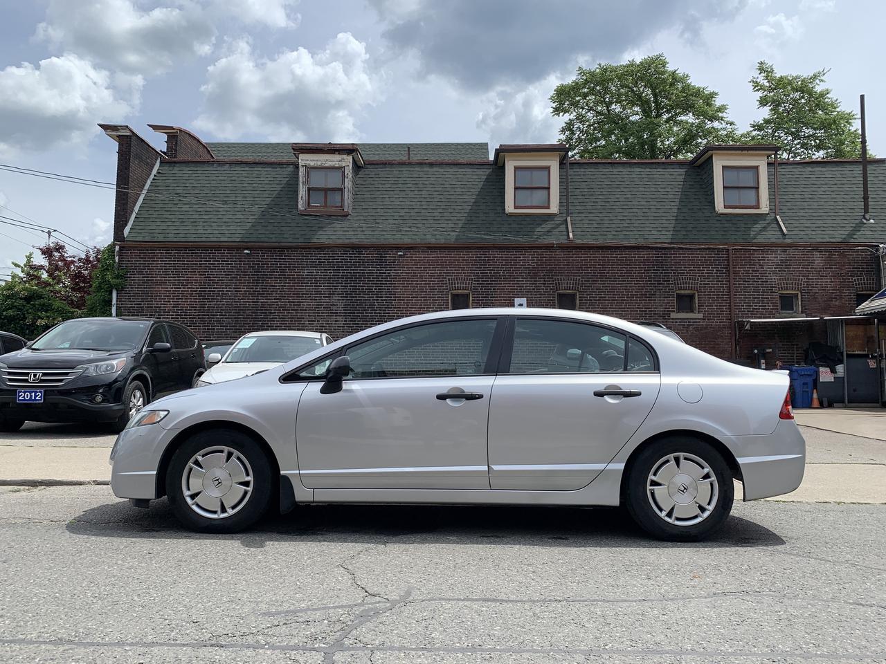 2009 Honda Civic 4dr Auto DX-G Photo