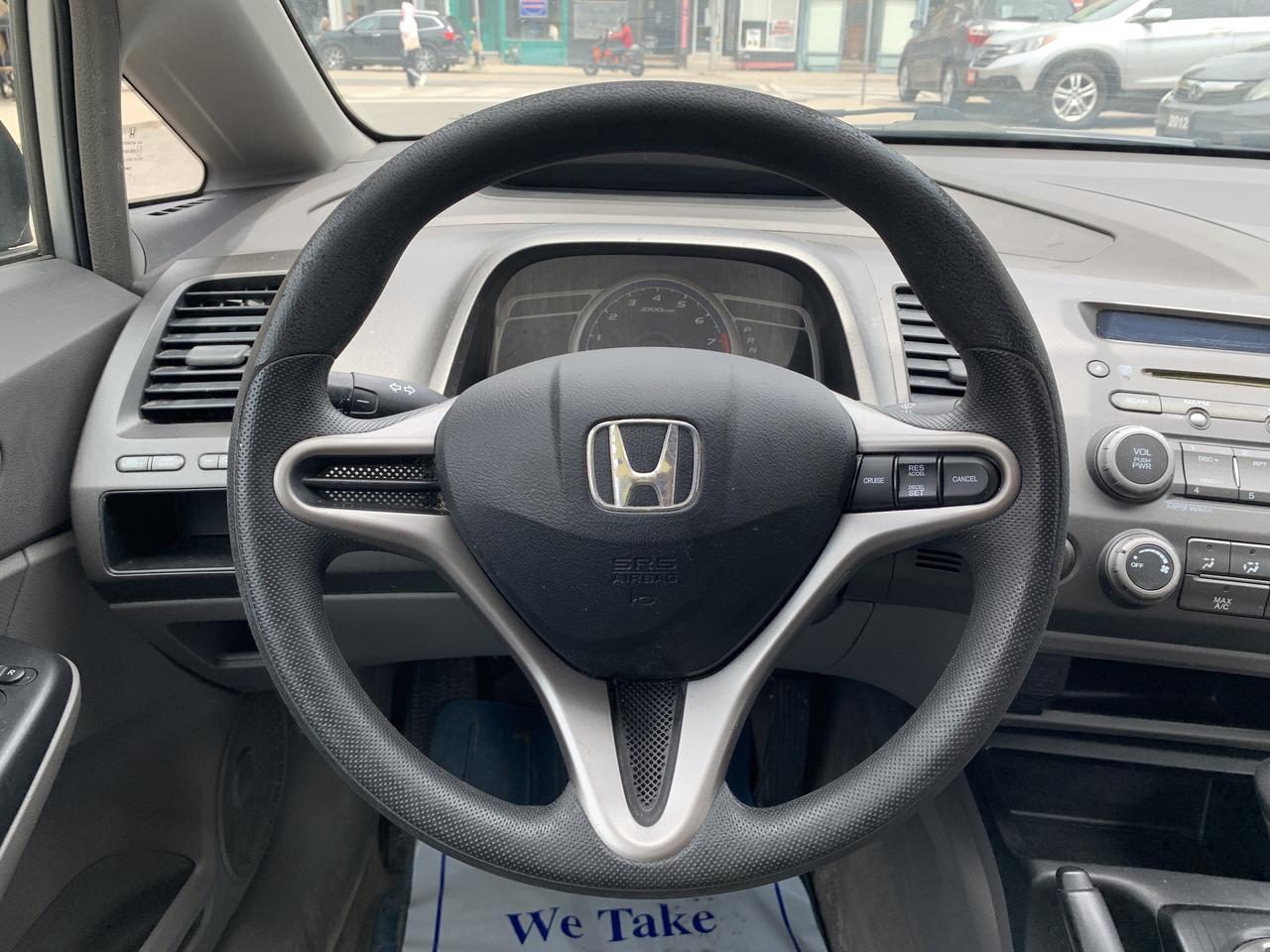 2009 Honda Civic 4dr Auto DX-G Photo
