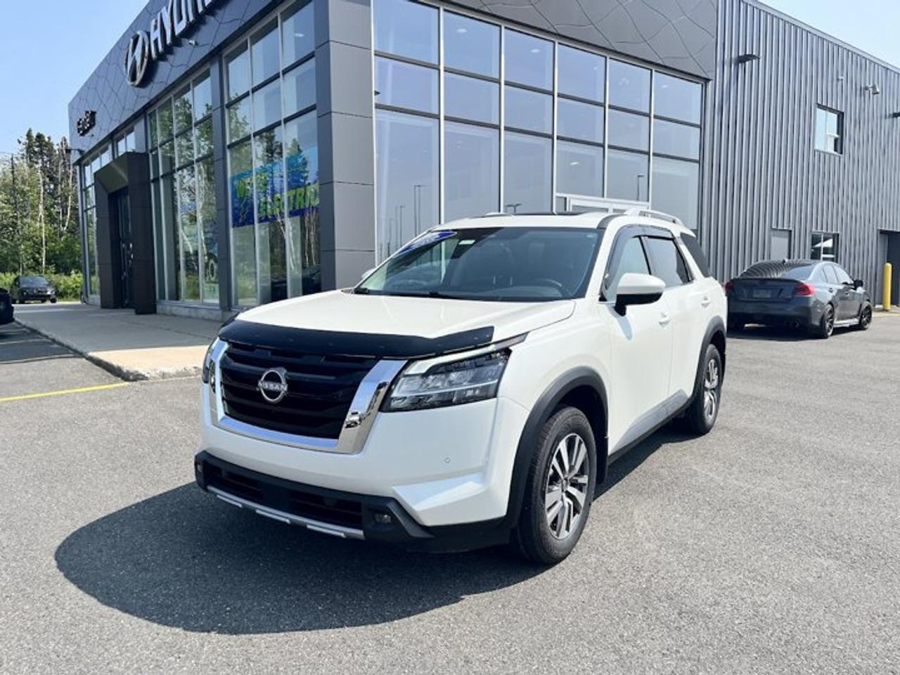 The *2023 Nissan Pathfinder SL 4WD* with *44,700 km* has been reconditioned with *new front and rear brakes, four new all-season tires, new cabin and engine air filters, and a fresh oil change*, giving the next owner added confidence from day one. Powered by a V6 engine paired with an automatic transmission and Nissans capable 4WD system, this white Pathfinder with a black interior is well suited for Canadian driving conditions while providing comfortable seating for up to seven with its third-row seating. The SL trim adds practical features including a power liftgate, heated steering wheel, memory drivers seat, and remote start, making everyday driving more convenient. This one-owner Pathfinder comes with a clean CARFAX and has also completed a full mechanical inspection, brake and tire inspections with measurements, a certified technician road test, and professional interior and exterior detailing as part of Steele Auto Groups reconditioning process. We invite you to book a viewing and test drive to see if this 2023 Nissan Pathfinder SL is the right fit for your needs.