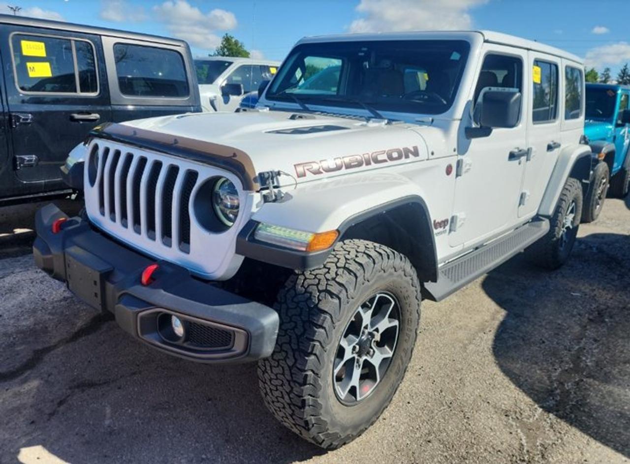 Check out this certified 2022 Jeep Wrangler Unlimited Rubicon 4WD V6 | Manual | Leather | Nav | Cold Weather Group | Freedom Top |. Its Manual transmission and 3.6 L engine will keep you going. This Jeep Wrangler comes equipped with these options: Navigation System, Leather, Air Conditioning, 4WD, Tilt Steering Wheel, Steering Radio Controls, Power Windows, Power Locks, Traction Control, and Power Mirrors. Test drive this vehicle at Mark Wilsons Better Used Cars, 5055 Whitelaw Road, Guelph, ON N1H 6J4.MASSIVE SELECTION: 500+ vehicles in ONE LOCATION, all Live Market Priced for the best value!STRAIGHTFORWARD & TRANSPARENT PRICING: Our Advertised Price INCLUDES:Safety Certification! (No separate certification fee upcharge).FREE Carfax History Report!NO upcharge for paying cash!CONFIDENCE & PEACE OF MIND: 30-Day/3,000 km Warranty INCLUDED! Plus a 5-Day Exchange Privilege!*EASY FINANCING: Better-than-bank rates, $0 Down, and 3 Months No Payments available OAC. BAD CREDIT APPROVED HERE!WE BUY CARS: Get Top Dollar for your trade, or sell us your vehicle for CASH even if you dont buy ours!www.shopwilsons.comAn Honest, Transparent Buying Experience. Trusted in business since 1961!(Cash Prices Exclude HST and Licensing Fees only.)