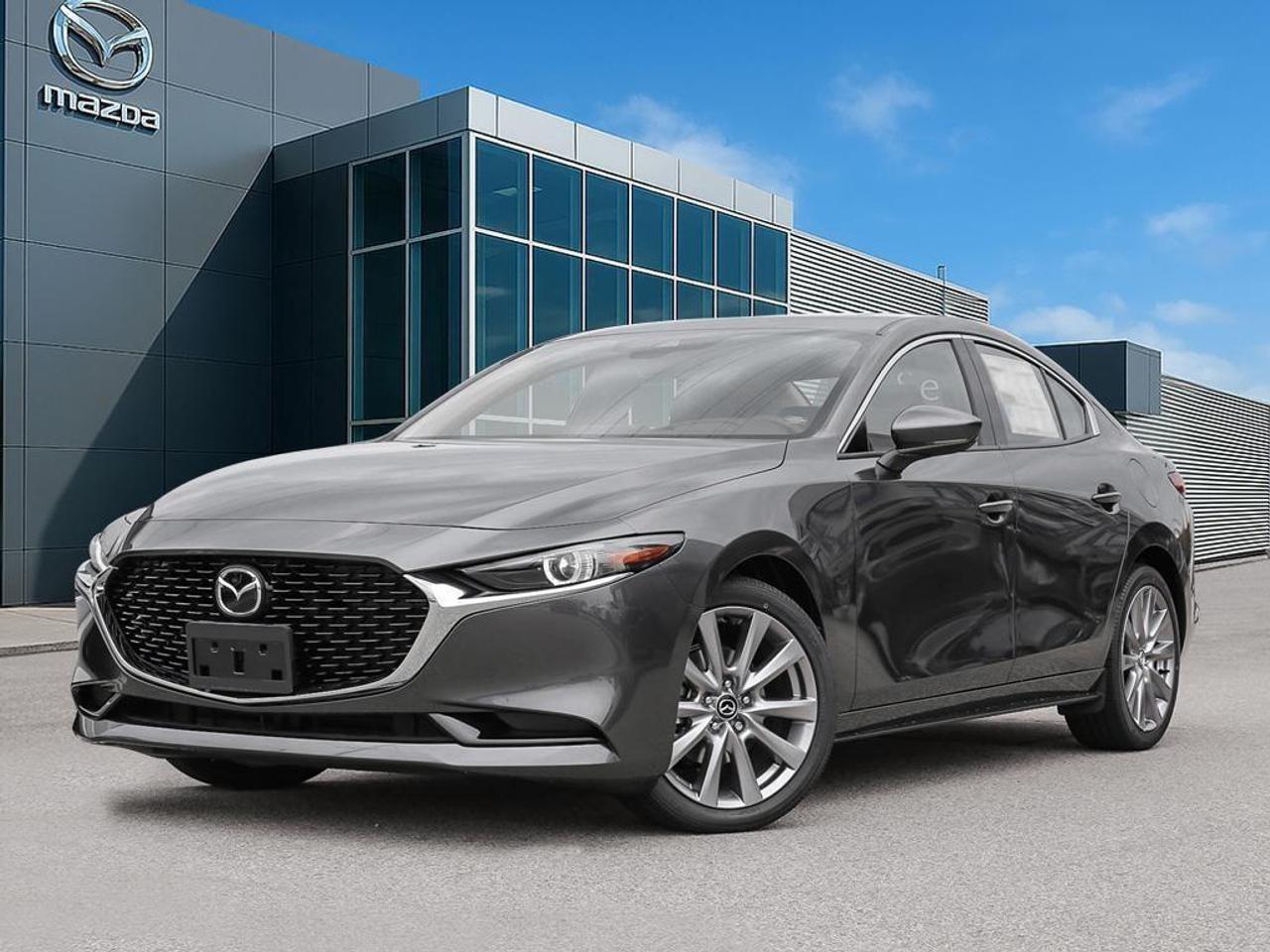 <p>Experience the thrill of driving the all-new 2026 Mazda Mazda3 GT i-ACTIV AWD, a stunning gray AWD sedan that promises superb handling and an unforgettable driving experience. With its sleek silhouette and the distinctive Polymetal Grey Metallic finish, this vehicle is a head-turner on every road.</p><p>Step inside to discover a luxurious black leather interior designed for comfort and style, featuring a leather steering wheel, leather seats, and leatherette door trim inserts. Feel the warmth from the heated front seats and steering wheel, offering comfort during the colder months, while the sunroof adds a touch of elegance and openness to your journeys.</p><p>Stay connected and safe with state-of-the-art technology, including a heads-up display and a navigation system to guide your travels. The backup camera, lane assist, and adaptive cruise control make every drive safer and more enjoyable. Enjoy entertainment on the go with the satellite radio and smart device integration, while the Bluetooth connection ensures you remain in touch wherever you are.</p><p>The 2026 Mazda Mazda3 GT is perfect for families, professionals, or anyone who values style, safety, and performance in their vehicle. Visit Cobourg Mazda to learn more about this exceptional new Mazda3 and take advantage of the exclusive highlights like a 3.49% lease APR and special event funds. Contact us today for more information and to arrange a test drive!</p>