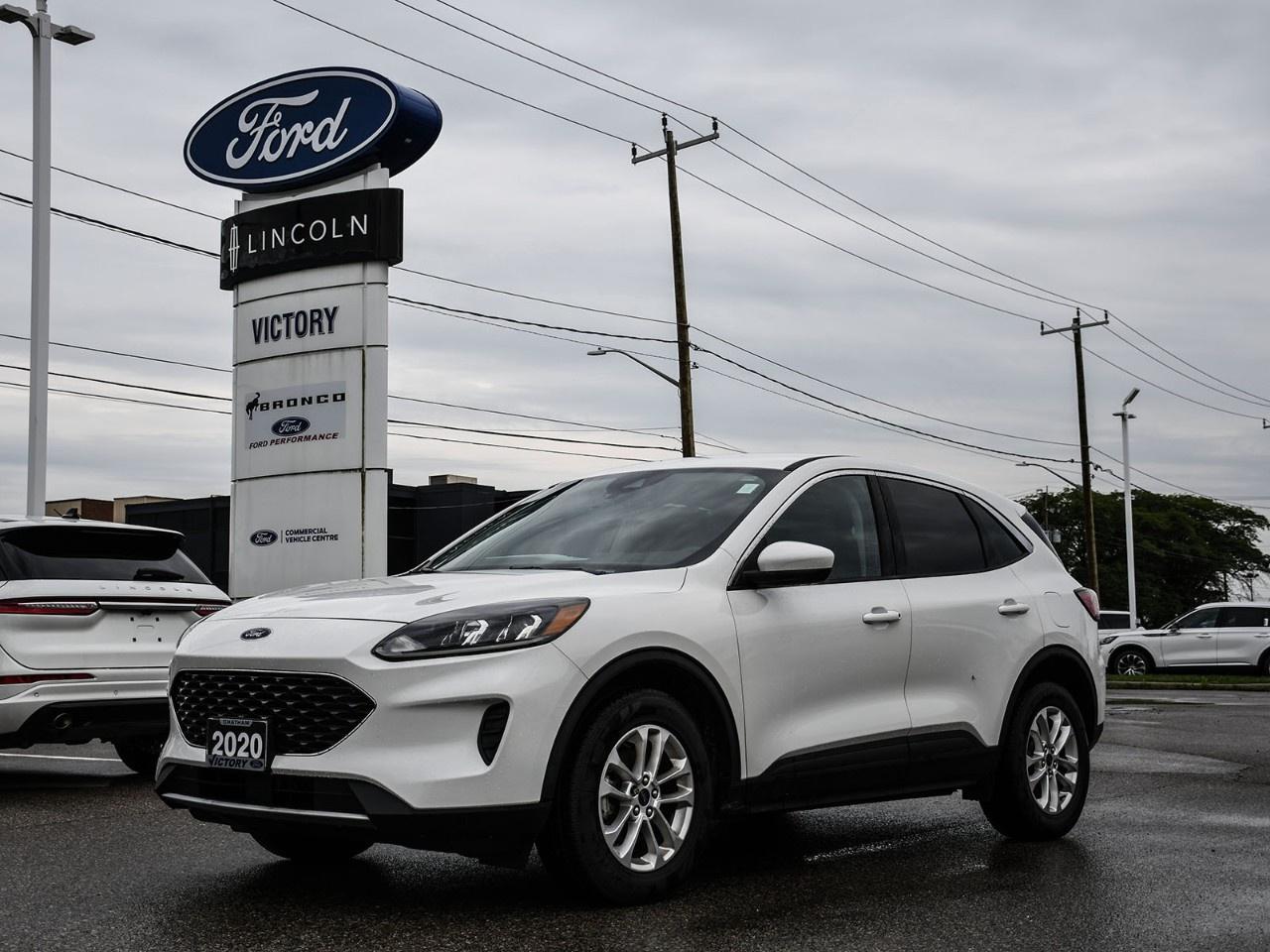<h2>NOW AVAILABLE AT VICTORY FORD LINCOLN</h2><h1>2020 Ford Escape SE AWD</h1><h3>Ford Co-Pilot360 Assist Package  Intelligent AWD  Turbocharged Performance  Versatile Compact SUV</h3><p>This 2020 Ford Escape SE AWD delivers the perfect blend of efficiency, capability, and advanced technology. Equipped with the Ford Co-Pilot360 Assist Package and Intelligent All-Wheel Drive, this Escape offers enhanced driver confidence, excellent fuel economy, and the versatility needed for everyday commuting and weekend adventures.</p><h3>POWER & PERFORMANCE</h3><ul><li><p>1.5L EcoBoost® Turbocharged Engine</p></li><li><p>8-Speed Automatic Transmission</p></li><li><p>Intelligent All-Wheel Drive (AWD)</p></li><li><p>181 Horsepower / 190 lb-ft Torque</p></li><li><p>Auto Start-Stop Technology</p></li><li><p>Selectable Drive Modes</p></li></ul><h3>PACKAGE</h3><ul><li><p>SE Equipment Group</p></li><li><p>Ford Co-Pilot360 Assist Package</p></li><li><p>Adaptive Cruise Control</p></li><li><p>Voice-Activated Navigation</p></li><li><p>Evasive Steering Assist</p></li><li><p>Lane Centering Assist</p></li></ul><h3>EXTERIOR FEATURES</h3><ul><li><p>17" Aluminum Wheels</p></li><li><p>LED Signature Lighting</p></li><li><p>Black Roof Rails</p></li><li><p>Rear Privacy Glass</p></li><li><p>Body-Colour Door Handles & Mirrors</p></li><li><p>Sleek Modern SUV Styling</p></li></ul><h3>INTERIOR & COMFORT</h3><ul><li><p>Premium Cloth Seating Surfaces</p></li><li><p>10-Way Power Driver Seat</p></li><li><p>Dual-Zone Automatic Climate Control</p></li><li><p>60/40 Split-Folding Rear Seats</p></li><li><p>Electronic Parking Brake</p></li><li><p>Spacious Cargo Area</p></li></ul><h3>TECHNOLOGY</h3><ul><li><p>SYNC® 3 Infotainment System</p></li><li><p>8" Touchscreen Display</p></li><li><p>Apple CarPlay® & Android Auto</p></li><li><p>FordPass Connect with Wi-Fi Hotspot</p></li><li><p>Voice-Activated Navigation</p></li><li><p>Rear View Camera</p></li></ul><h3>SAFETY & DRIVER ASSISTANCE</h3><ul><li><p>Ford Co-Pilot360 Assist Package</p></li><li><p>Adaptive Cruise Control with Stop & Go</p></li><li><p>Lane Centering Assist</p></li><li><p>Blind Spot Information System (BLIS®)</p></li><li><p>Evasive Steering Assist</p></li><li><p>Pre-Collision Assist with Automatic Emergency Braking</p></li><li><p>Rear View Camera</p></li></ul><h3>HIGHLIGHTS</h3><ul><li><p>Ford Co-Pilot360 Assist Package</p></li><li><p>Intelligent All-Wheel Drive</p></li><li><p>Voice-Activated Navigation</p></li><li><p>Adaptive Cruise Control</p></li><li><p>Turbocharged EcoBoost® Performance</p></li><li><p>Excellent Everyday Versatility</p></li></ul><h3>Special Offer:</h3><p><strong>Peace of Mind Included:</strong> 3-Month Comprehensive Warranty (for vehicles under 10 years old & under 160,000 km) No-Haggle, Live Market Pricing  Transparent & Competitive All-Inclusive Pricing: Fees, Reconditioning, and Full Detailing Included (Taxes & Licensing Extra)</p><h4>Additional Details:</h4><p><strong>Keys:</strong> Standard with one key. Additional keys (if provided by the previous owner) included at no cost. Optional key purchases available upon request.</p><p><strong>Visit Victory Ford Lincoln Today</strong> Schedule your appointment to experience this exceptional vehicle.</p>