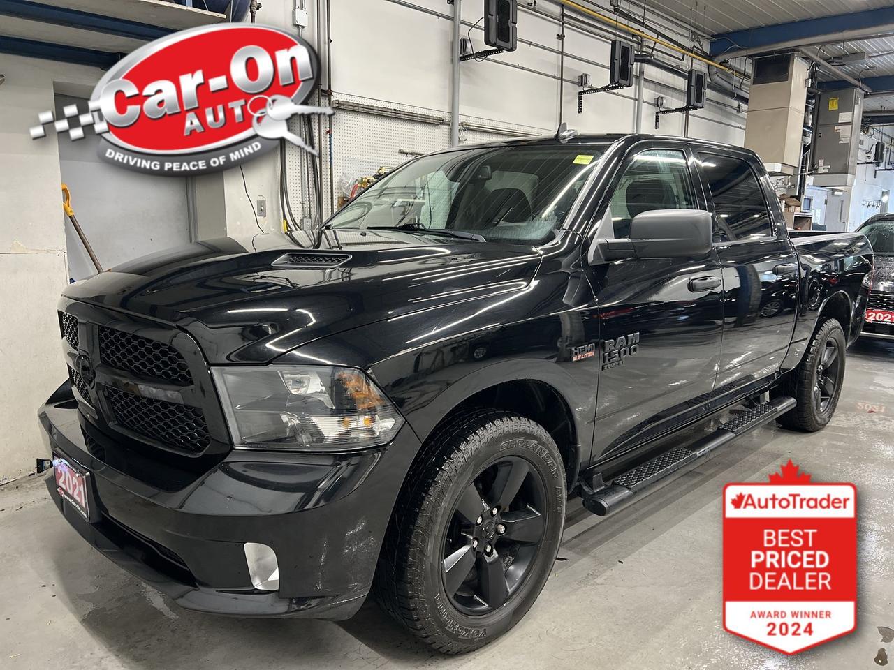 EXPRESS NIGHT EDITION CREW CAB 4X4 W/ 5.7L HEMI V8!!! Heated seats & steering, Android Auto/ Apple CarPlay, remote start, spray-in bedliner, 20-inch black alloys, backup camera, tow package, 5-foot 7-inch box, running boards, dual-zone climate control, keyless entry, power locks, power mirrors, power seat, power windows, automatic headlights, cruise control, Bluetooth and Sirius XM!!