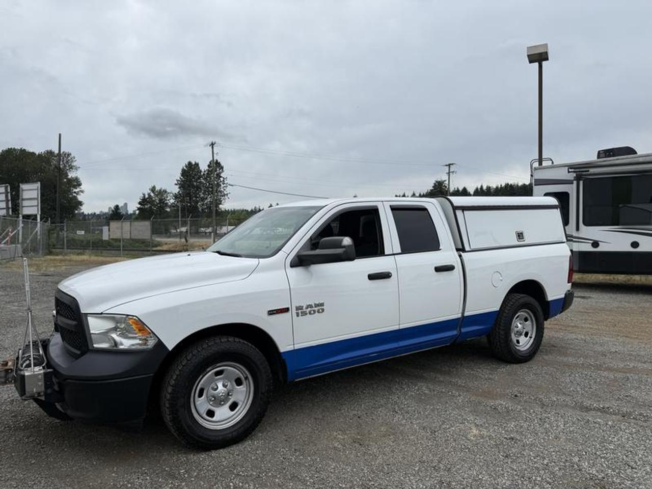 2016 RAM 1500 Tradesman Quad Cab 2WD, 3.0L V6 DIESEL engine, bed slide, front winch, air compressor, automatic, RWD, 4-Wheel ABS, cruise control, AM/FM radio, CD player, power door locks, power windows.  $18,210.00 plus $375 processing fee, $18,585.00 total payment obligation before taxes.   Listing report, warranty, contract commitment cancellation fee, financing available on approved credit (some limitations and exceptions may apply). All above specifications and information is considered to be accurate but is not guaranteed and no opinion or advice is given as to whether this item should be purchased. We do not allow test drives due to theft, fraud, acts of vandalism and undetectable impaired driving. Instead we provide the following benefits: Complimentary Warranty (with options to extend), Limited Money Back Satisfaction Guarantee on Fully Completed Contracts, Contract Commitment Cancellation, and an Open-Ended Sell-Back Option. Ask seller for details or call 604-522-REPO(7376) to confirm listing availability.