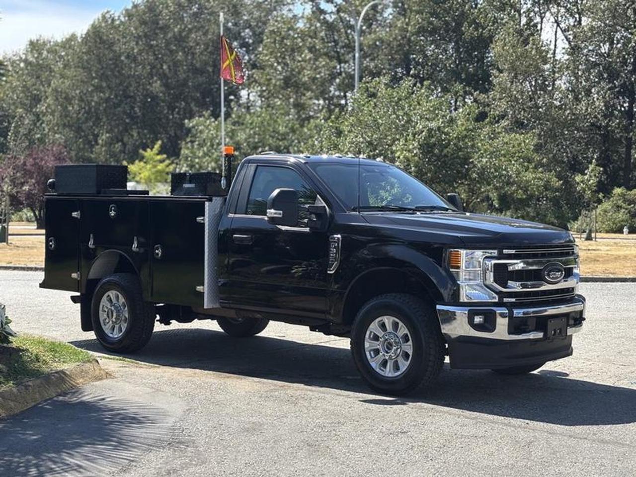 This 2022 Ford F-350 XL Regular Cab Service Truck is powered by a 7.3L V8 gasoline engine paired with an automatic transmission and four-wheel drive. Built on Fords Super Duty platform, this truck is configured for commercial, fleet, utility, and contractor applications with a durable service body designed to keep tools and equipment organized and secure.

The service body features multiple exterior storage cabinets with integrated shelving, providing convenient access to tools and supplies while maximizing cargo organization. Additional equipment includes a trailer hitch receiver, backup camera, Bluetooth connectivity, USB-A and USB-C ports, automatic headlights, heated mirrors, air conditioning and heat, cruise control, and power windows, power door locks, and power mirrors.

Finished in black with a tan cloth interior, this F-350 XL combines the capability of Fords 7.3L V8 with the practicality of a fully equipped service body, making it well suited for construction, utility, municipal, and fleet service operations. This item is currently OFFSITE. You must register an appointment with our office to schedule an offsite viewing. Appointments must be made a minimum of one business day in advance (and as defined by the days that Repo.com is open for business) before your appointment can be scheduled and confirmed. We may, at our own discretion, instead opt to transport smaller items to Repo.coms main yard for viewing purposes.  $79,870.00 plus $375 processing fee, $80,245.00 total payment obligation before taxes.   Listing report, warranty, contract commitment cancellation fee, financing available on approved credit (some limitations and exceptions may apply). All above specifications and information is considered to be accurate but is not guaranteed and no opinion or advice is given as to whether this item should be purchased. We do not allow test drives due to theft, fraud, acts of vandalism and undetectable impaired driving. Instead we provide the following benefits: Complimentary Warranty (with options to extend), Limited Money Back Satisfaction Guarantee on Fully Completed Contracts, Contract Commitment Cancellation, and an Open-Ended Sell-Back Option. Ask seller for details or call 604-522-REPO(7376) to confirm listing availability.