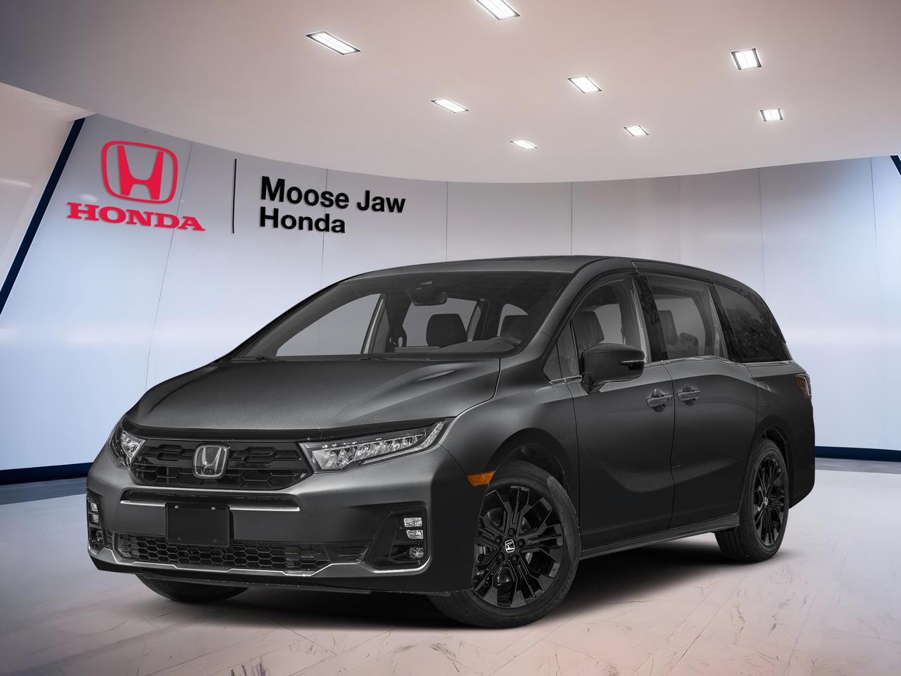 Meet the brand new 2026 Honda Odyssey Black Edition at Moose Jaw Honda in Moose Jaw. This family-focused minivan pairs a bold black exterior with a matching black interior for a clean, upscale look. With its proven V6 power, smooth 10-speed automatic transmission, and front-wheel drive layout, the 2026 Honda Odyssey Black Edition is built to make daily driving, road trips, and busy family schedules feel easy.

The 2026 Honda Odyssey Black Edition is known for blending strong performance with the flexibility that minivan shoppers want most. Its 3.5-litre 24-valve direct-injection SOHC i-VTEC V6 delivers confident passing power and smooth acceleration. The 10-speed automatic transmission with Shift mode helps provide refined response in city traffic and on the highway, while the front-wheel drive setup supports stable, predictable handling in changing Prairie conditions.

FEATURES OF THE Odyssey Black Edition
»» Black exterior creates a bold presence
»» Black interior adds a premium feel
»» 3.5-litre V6 delivers smooth strong power
»» 10-speed automatic supports refined shifting

ADVANCED SAFETY FEATURES
»» Traction control supports confident road grip
»» Front-wheel drive aids stable everyday handling
»» Strong minivan design supports family travel
»» Honda engineering focuses on occupant protection

PERFORMANCE AND EFFICIENCY
»» 3.5-litre V6 offers confident acceleration
»» Direct injection helps optimize engine response
»» 10-speed automatic enables smooth power delivery
»» Shift mode adds driver control

COMFORT AND CONVENIENCE
»» Spacious cabin suits busy family life
»» Easy entry height helps daily use
»» Minivan layout supports flexible passenger comfort
»» Black cabin brings a refined atmosphere

TECHNOLOGY AND CONNECTIVITY
»» Clear driver controls support simple operation
»» Modern transmission interface feels intuitive
»» Useful displays keep key info visible
»» Family-ready design supports connected travel

CARGO SPACE
»» Minivan body offers generous storage potential
»» Wide rear area helps load gear
»» Cabin layout supports people and cargo
»» Ideal for errands trips and luggage

WHAT OTHER OWNERS LIKE
»» Smooth V6 power for highway merging
»» Practical cabin for family daily needs
»» Comfortable ride on longer drives
»» Flexible space for passengers and cargo

For drivers who need room, confidence, and everyday versatility, the 2026 Honda Odyssey Black Edition is a smart choice. Its strong V6 engine, polished automatic transmission, and family-friendly minivan design make it well suited for school runs, weekend travel, and full passenger loads. Visit Moose Jaw Honda in Moose Jaw to see how the 2026 Honda Odyssey Black Edition delivers comfort, capability, and practical value in one well-rounded package.

This 2026 Honda Odyssey Black Editions VIN is: 5FNRL6H05TB503230 .<p>Meet the brand new 2026 Honda Odyssey Black Edition at Moose Jaw Honda in Moose Jaw. This family-focused minivan pairs a bold black exterior with a matching black interior for a clean</p>
<p> and busy family schedules feel easy.

The 2026 Honda Odyssey Black Edition is known for blending strong performance with the flexibility that minivan shoppers want most. Its 3.5-litre 24-valve direct-injection SOHC i-VTEC V6 delivers confident passing power and smooth acceleration. The 10-speed automatic transmission with Shift mode helps provide refined response in city traffic and on the highway</p>
<p> predictable handling in changing Prairie conditions.

FEATURES OF THE Odyssey Black Edition
»» Black exterior creates a bold presence
»» Black interior adds a premium feel
»» 3.5-litre V6 delivers smooth strong power
»» 10-speed automatic supports refined shifting

ADVANCED SAFETY FEATURES
»» Traction control supports confident road grip
»» Front-wheel drive aids stable everyday handling
»» Strong minivan design supports family travel
»» Honda engineering focuses on occupant protection

PERFORMANCE AND EFFICIENCY
»» 3.5-litre V6 offers confident acceleration
»» Direct injection helps optimize engine response
»» 10-speed automatic enables smooth power delivery
»» Shift mode adds driver control

COMFORT AND CONVENIENCE
»» Spacious cabin suits busy family life
»» Easy entry height helps daily use
»» Minivan layout supports flexible passenger comfort
»» Black cabin brings a refined atmosphere

TECHNOLOGY AND CONNECTIVITY
»» Clear driver controls support simple operation
»» Modern transmission interface feels intuitive
»» Useful displays keep key info visible
»» Family-ready design supports connected travel

CARGO SPACE
»» Minivan body offers generous storage potential
»» Wide rear area helps load gear
»» Cabin layout supports people and cargo
»» Ideal for errands trips and luggage

WHAT OTHER OWNERS LIKE
»» Smooth V6 power for highway merging
»» Practical cabin for family daily needs
»» Comfortable ride on longer drives
»» Flexible space for passengers and cargo

For drivers who need room</p>
<p> and full passenger loads. Visit Moose Jaw Honda in Moose Jaw to see how the 2026 Honda Odyssey Black Edition delivers comfort</p>
<p> and practical value in one well-rounded package.

This 2026 Honda Odyssey Black Editions VIN is: 5FNRL6H05TB503230 .</p>
