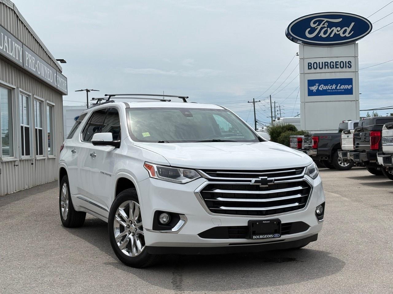 <p>Experience unparalleled elegance and performance with the 2020 Chevrolet Traverse High Country in a stunning white finish, featuring an advanced all-wheel-drive system for superior handling. This SUV commands attention with its sophisticated styling and robust design.</p><p>Inside, you'll indulge in a luxurious black interior accentuated by leather seats that ensure utmost comfort. The cabin is thoughtfully designed with a third-row option providing ample space for family and friends, making every trip enjoyable. Revel in the sleek design enhanced by premium features like a panoramic sunroof/moonroof, which bathes the interior in natural light.</p><p>The Traverse High Country is well-equipped with cutting-edge technology and safety features. Stay connected through the smart device integration, and enjoy your favorite tunes via the satellite radio. The intuitive navigation system, coupled with adaptive cruise control, ensures a seamless journey. Safety is paramount with features including lane assist, parking sensors, and a backup camera, all ensuring peace of mind on the road.</p><p>This vehicle is perfectly suited for discerning drivers who prioritize luxury, comfort, and advanced technology. Whether you're navigating city streets or venturing onto the open highway, the Chevrolet Traverse High Country provides a first-class driving experience. For those who seek an SUV that excels in both style and substance, look no further. Contact Bourgeois Motors Ltd. today to schedule your test drive and explore the exceptional features of this refined vehicle.</p> <p><strong>Why Choose the Bourgeois Auto Group?</strong></p><p>For 80 years, Bourgeois Auto Group has been delivering exceptional automotive experiences. Our factor trained teams work to ensure you receive the shopping experience you deserve; whether you're looking for a new or new-to-you vehicle.</p><p>Shop 24/7 with our online showroom and chat service, ensuring convenience every step of the way. No hidden fees, full disclosure, and every pre-owned vehicle comes with a Carfax® report for peace of mind.</p><p>We offer a wide selection of pre-owned vehicles, all competitively priced using real-time market data. Get the best deal on your purchase and trade-in with our free Live Market Analysis report.</p><p>Looking to sell your car? We buy any make or modelno purchase required. Our simple to use online trade valuation tool will provide you with a clear, transparent selling experience whether you buy our car or not.</p><p>Backed by hundreds dedicated employees across 4 convenient locations, were here to meet all your automotive needs. Visit us in Midland or Parry Sound and explore our inventory or schedule your next service today.</p> <p><strong>Financing Your Next Vehicle with Bourgeois Motors Ford in Midland:</strong></p><p>At Bourgeois Motors Ford, we make financing your next vehicle simple and stress-free! Our team works with trusted lenders to find flexible options tailored to your budget. Drive away with confidenceapply today!</p><p>Take advantage of our online pre-qualification tool, backed by Equifax and TD Bank to find the payment that works for you. Simply <a href=https://www.bourgeoismotors.com/free-credit-check/ rel=nofollow><strong>CLICK HERE</strong></a><strong> </strong>to use our secure online credit tool with no impact to your credit.</p>