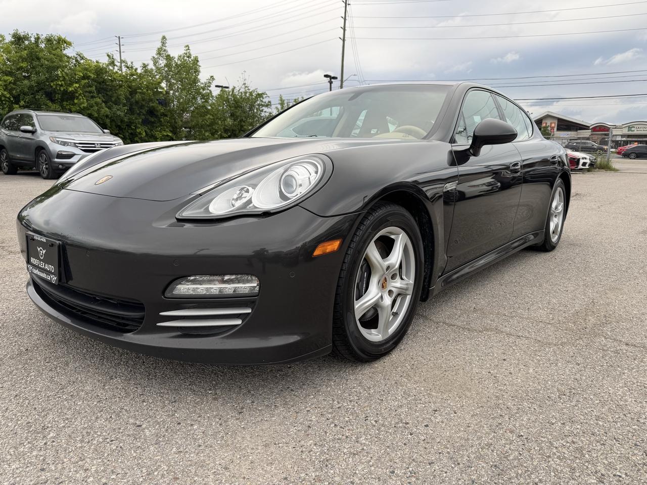 <html>
<p>2011 PORSCHE PANAMERA 4 AWD comes in excellent condition,,,,,LOW KILOMETRES,,,ONE OWNER ONLY,,,,CLEAN CARFAX REPORT,,,,runs & drives like brand new....Fully Loaded, Equipped with Backup Camera, Navigation System, Power Sunroof, Leather interior, Power Steering Wheel, Power mirrors, heated mirrors, Power Seats, heated seats, keyless entry,  Power doors lock, Bluetooth, Cruise Control and much more....Fully certified included in the price, HST & Licensing extra, this vehicle has been serviced in 2012, 2013, 2014, 2015, 2016, 2017, 2018, 2019, 2020 & up to recent in Porsche Store...Service Records available upon request...Financing available with the lowest interest rates and affordable monthly payments............Please contact us @ 4 1 6 5 4 3 4 4 3 8 for more details....At Rideflex Auto we are serving our clients across G.T.A, Toronto, Vaughan, Richmond Hill, Newmarket, Bradford, Markham, Mississauga, Scarborough, Pickering, Ajax, Oakville, Hamilton, Brampton, Waterloo, Burlington, Aurora, Milton, Whitby, Kitchener London, Brantford, Barrie, Milton.......</p>
<br>
<p>Buy with confidence from Rideflex Auto...</p>
<br>
<br>
</html>