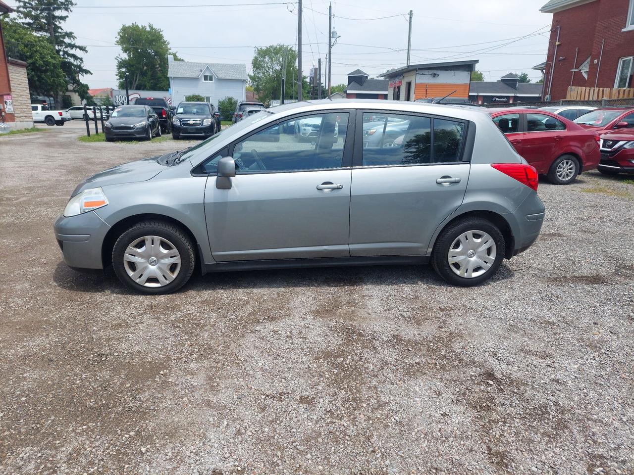 2010 Nissan Versa 5dr HB I4 Auto 1.8 S Photo