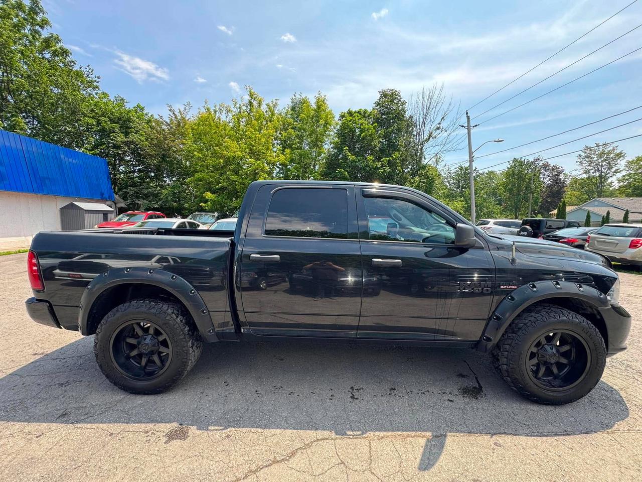 2017 RAM 1500 4WD Crew Cab 140.5" Express *Ltd Avail* Photo
