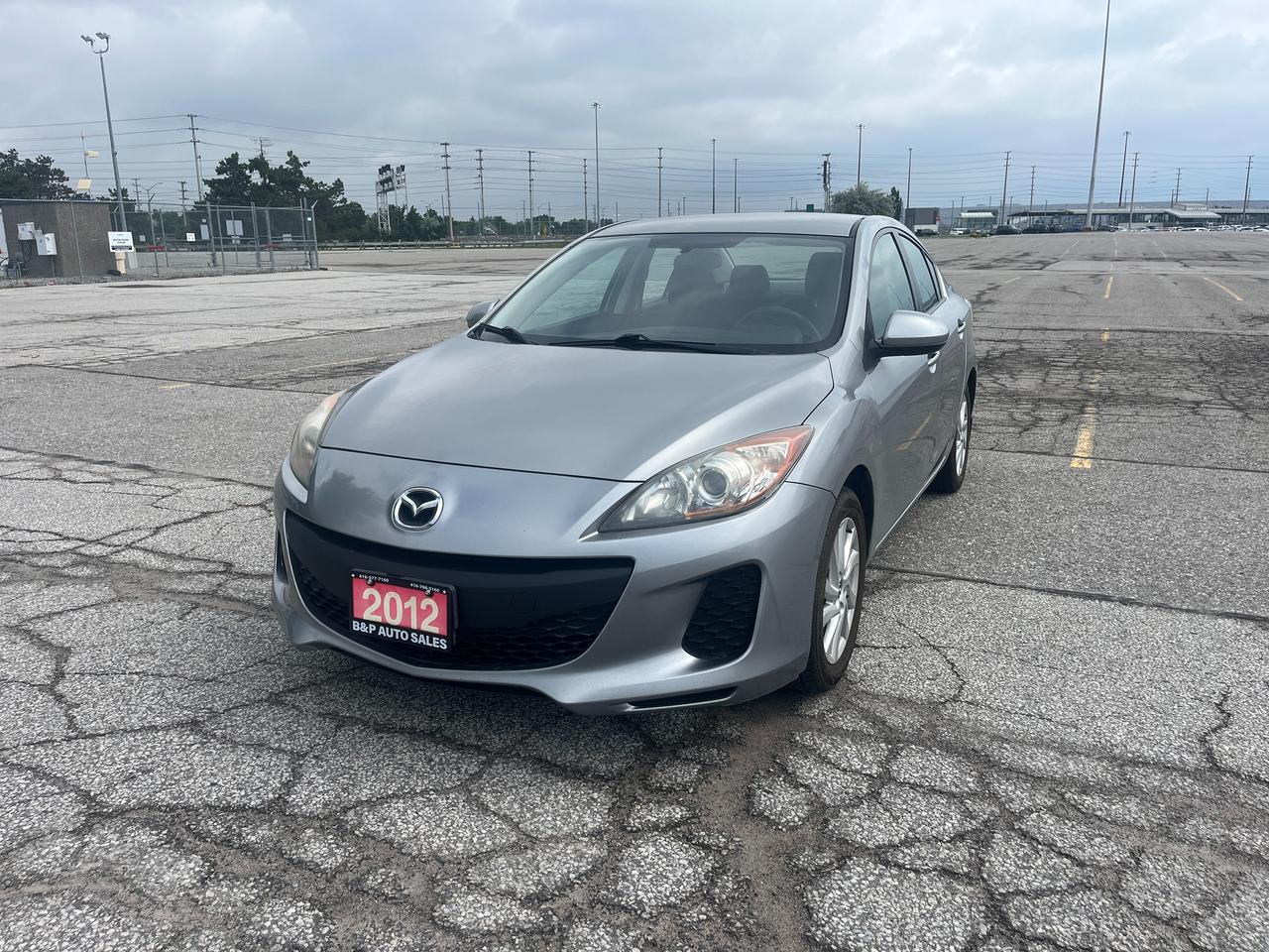 2012 Mazda MAZDA3 4dr Sdn Auto GX Photo0