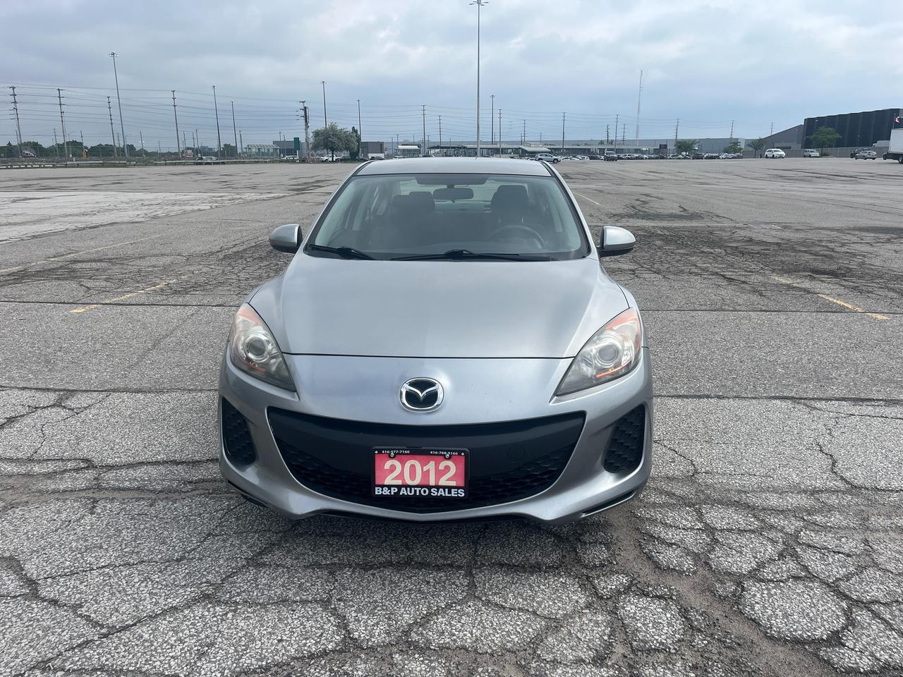 2012 Mazda MAZDA3 4dr Sdn Auto GX Photo