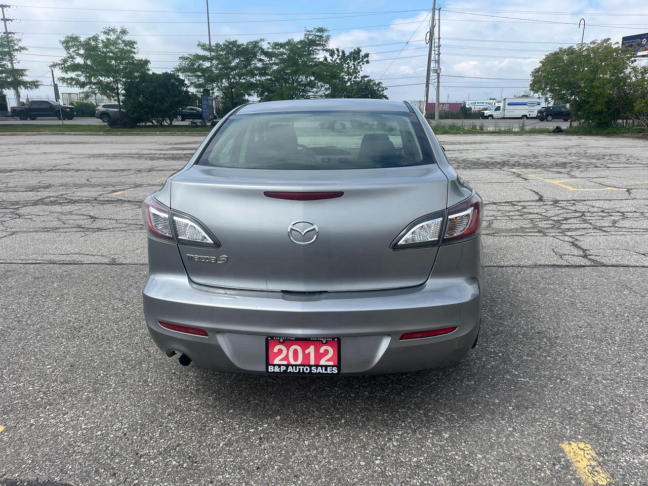 2012 Mazda MAZDA3 4dr Sdn Auto GX Photo