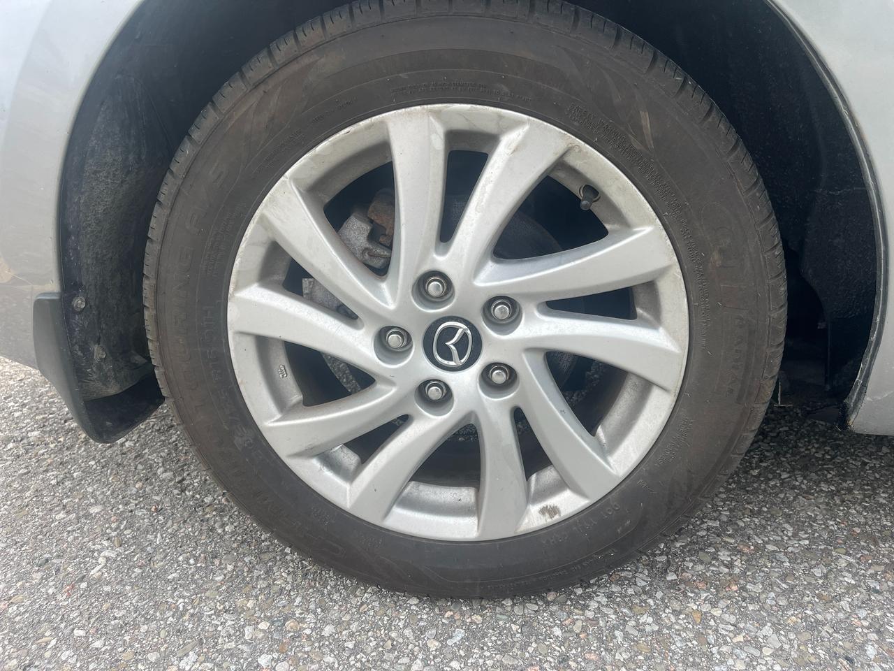 2012 Mazda MAZDA3 4dr Sdn Auto GX Photo