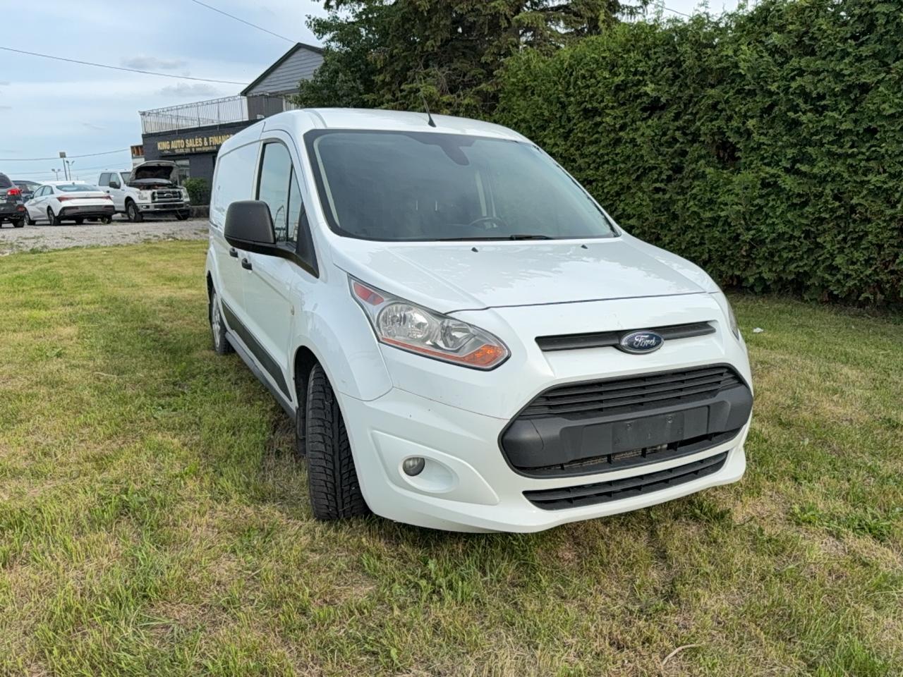 <p>Discover the ultimate in versatility and reliability with this pre-owned 2018 Ford Transit Connect XLT, ready to tackle your everyday adventures or business needs. Dressed in a clean, classic white exterior and featuring a comfortable gray interior, this van is designed for practicality and ease of use. Its flexible fuel capability and smooth automatic transmission ensure efficient and adaptable performance, while the front-wheel drive provides confident handling in various Canadian conditions. With a generous four-door configuration, loading and unloading passengers or cargo is a breeze.</p><p>This 2018 Ford Transit Connect XLT, with 177,600 kilometers on the odometer, has been well-maintained and is eager to serve its next owner. Whether youre a small business owner looking for a dependable workhorse, a growing family needing extra space, or an adventurer seeking a versatile van for your projects, this Transit Connect XLT offers a smart and capable solution. At King Auto Sales & Finance, we pride ourselves on offering quality pre-owned vehicles that deliver exceptional value.</p><p>Here are five standout features of this 2018 Ford Transit Connect XLT:</p><ul><li><strong>Flex Fuel Capability:</strong> Go further and save money by having the option to run on gasoline or a blend of ethanol, giving you flexibility at the pump.</li><li><strong>Automatic Transmission:</strong> Enjoy a smooth and effortless driving experience, perfect for city commutes and long highway stretches alike.</li><li><strong>Spacious Minivan/Van Body Style:</strong> Maximize your carrying capacity, whether its for clients, gear, or your weekend getaway essentials.</li><li><strong>Four-Door Configuration:</strong> Experience unparalleled accessibility for passengers and cargo, making every trip more convenient.</li><li><strong>Reliable Front-Wheel Drive:</strong> Benefit from excellent traction and handling, providing confidence on the road through diverse Canadian weather.</li></ul><p><strong><em>Powered by AutoIntelligence&trade;</em></strong></p><p>Vehicle information has been generated using artificial intelligence and is provided for informational purposes only. While efforts are made to ensure accuracy, please confirm all details directly with the dealer.</p>