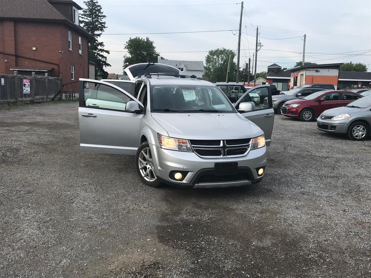 <p>2013 DODGE JOURNEY RT V6 FULLYLOAD LEATHER INTERIOR IN EXCELLENT CONDITION COMES CERTIFIED POWER WINDOWS POWER LOCKS KEYLESS ENTRY POWER STEARING CRUISE CONTROL DVD PLAYER SCREEN AC ALLOY WHEELS FOGLIGHTS AM/FM/CD/AUX BLUETOOTH DVD LEATHER CLEAN INTERIOR VERY CLEAN CAR INSIDE OUT BACK UP CAMERA V6 DEALER $6999 plus applicable taxes Hst/lic Financing available all credit welcome Bad or good SHUAIB AUTO 766 SIMCOE STREET SOUTH OSHAWA <a href=tel:647 303 7143>647 303 7143</a></p>
