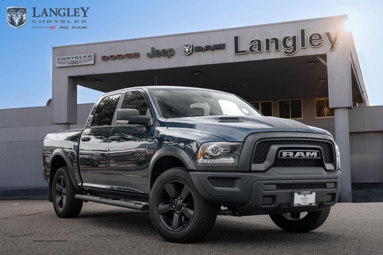 <p><strong>2021 RAM 1500 Classic Warlock 4x4 Crew Cab 5'7" Box</strong></p><p>A bold and rugged pickup designed to handle demanding tasks while offering refined comfort and versatile utility for everyday use.</p><ul><li><p>Engine: 5.7L HEMI V8 (395 hp, 410 lb-ft torque)</p></li><li><p>Drivetrain: 4x4 with 8-speed automatic transmission</p></li><li><p>Max Towing Capacity: 10,610 lbs</p></li><li><p>Infotainment: Uconnect system with touchscreen</p></li><li><p>Capability: Heavy-duty rear shocks and sport performance hood</p></li></ul><p>Come book a test drive at Langley Chrysler, conveniently located in Langley, British Columbia.</p>

<p>*All prices plus applicable taxes, applicable environmental recovery charges, documentation of $599 and full tank of fuel surcharge of $76 if a full tank is chosen. <br />Other protection items available that are not included in the above price:<br />Tire & Rim Protection and Key fob insurance starting from $599<br />Service contracts (extended warranties) for coverage up to 7 years and 200,000 kms starting from $599<br />Custom vehicle accessory packages, mudflaps and deflectors, tire and rim packages, lift kits, exhaust kits and tonneau covers, canopies and much more that can be added to your payment at time of purchase<br />Undercoating, rust modules, and full protection packages starting from $199<br />Financing Fee of $500 when applicable<br />Flexible life, disability and critical illness insurances to protect portions of or the entire length of vehicle loan</p>