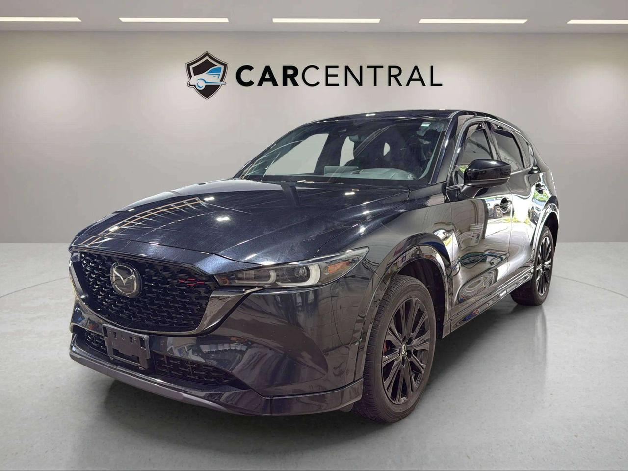 Sport Design with Turbo, Turbocharged Engine, AWD, Heated Front Seats, Heated Steering Wheel, Leather Seats, Sunroof, Blind Spot Monitoring, Rear Cross Traffic Alert

Whether youre carving through mountain switchbacks or logging miles on a long highway haul, the 2022 Mazda CX-5 Sport Design with Turbo is built to make every journey feel deliberate. Mazdas KODO design philosophy and Skyactiv platform deliver a driving character that feels closer to sport sedan than crossover &mdash; responsive, refined, and rewarding in a way few rivals in this class can match. This is a vehicle that earns your trust mile after mile.

Available now at Car Central, Barries largest used car dealership and the most trusted in Simcoe County. Rated 4.9 stars on Google with over 1,200 five-star reviews, weve earned our reputation by making car buying simple, best price upfront, no haggling, no pressure. With 200+ vehicles in stock and a team that puts you first, come see why more people choose Car Central than anywhere else in the region.

CARFAX: Free Carfax report on all our listing. Just go on our website and click view Carfax report.


CERTIFICATION: Have your new pre-owned vehicle certified at Car Central! We offer a full safety inspection exceeding industry standards including oil change, and professional detailing prior to delivery. Vehicles are not drivable, if not certified and not e-tested, certification package is available for $749. All trade-ins are welcome. Taxes, licensing are extra.


PRICE: We believe everyone deserves to get the best price possible on their new pre-owned vehicle without having to go through uncomfortable negotiations. Our Market Value Pricing (MVP) allows you to buy with confidence. We do this by constantly monitoring the market and adjusting our prices below the market average you can buy confidently knowing you are getting the best price possible! No haggle pricing. No pressure. Why pay more somewhere else. **CASH PRICE** will be an additional $1750 and it will include 1 Year or 15,000 kms Powertrain warranty. 


SERVICE: Schedule an appointment with Car Central Service Centre to bring your vehicle in for all its needs. Simply click on the link below and book your appointment. Our licensed technicians and repair facility offer the highest quality services at the most competitive prices. All work is manufacturer warranty approved and comes with 2-year parts and labour warranty. Start saving hundreds of dollars by servicing your vehicle with Car Central. Call us at 705-503-5000 or follow this link to book an appointment today! https://www.carcentral.ca/contact-us/


WARRANTY: This vehicle qualifies for an extended warranty with different terms and coverages available. Dont forget to ask for help choosing the right one for you.


FINANCING: No credit? New to the country? Bankruptcy? Consumer proposal? Collections? You dont need good credit to finance a vehicle. Bad credit is usually good enough. Give our finance and credit experts a chance to get you approved and start rebuilding credit today! On the spot financing, instant approvals, and no payments for 6 months is also available O.A.C!


Any vehicle stock number starting with Letter R are Previous daily Rental.


With over 30 years of experience, Car Central is a proud family-owned business and a trusted member of the UCDA. Our mission is to offer not only the best prices but also high-quality, reliable vehicles and an exceptional customer experience. We believe in making your car buying journey stress-free, with absolutely no pressurejust honest service you can rely on."