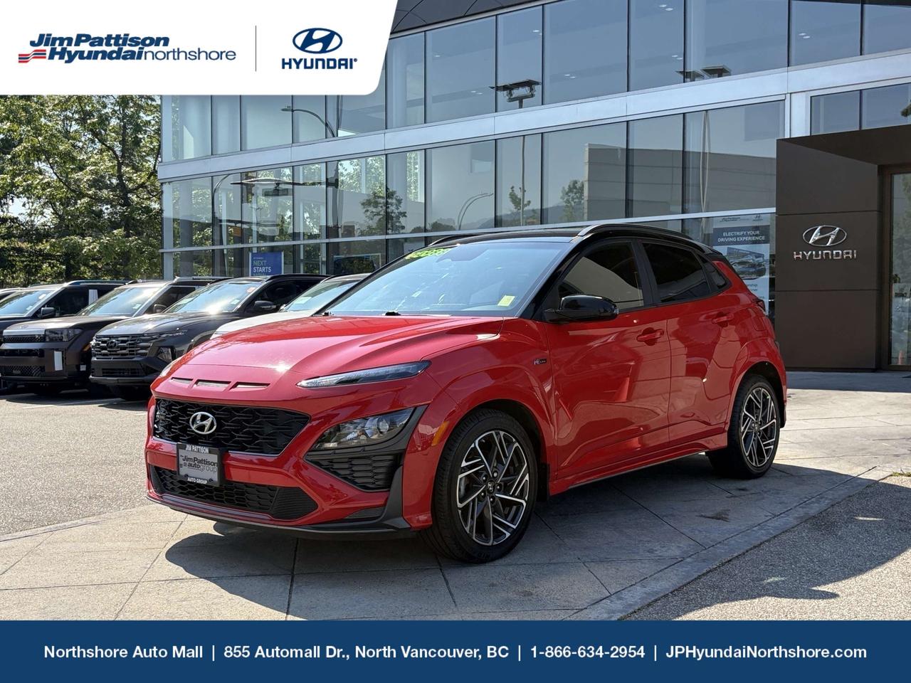 2022 Hyundai Kona N-Line 1.6T AWD  Ignite Flame Red with Black Roof, Sport Turbo! Inject some serious excitement into your daily drive. This jaw-dropping 2022 Hyundai Kona N-Line AWD has just landed at our North Vancouver auto mall, delivering a rare combination of race-inspired styling, sports performance, and all-weather crossover capability! With 82,263 original kilometres, this homegrown crossover has been completely mechanically vetted by our certified shop. It stands ready to carve up tight mountain passes or save you gas during morning commutes over the Lions Gate or Ironworkers Memorial bridges. THE AGGRESSIVE "N-LINE" ROAD PRESENCE. Forget subtle economy crossovers. The factory N-Line Package wraps this machine in a performance-focused layout that commands attention:Two-Tone Custom Look: Finished in jaw-dropping Ignite Flame Red paired with a factory-contrasting Phantom Black Roof. Race-Inspired Styling: Features an aggressive N-Line front grille, body-coloured sports cladding, a rear lip spoiler, and a sports dual-tip exhaust system.Call Our Performance Specialists: (866) 634-2954Visit Our Lot: 855 Automall Drive, North Vancouver, BC Book Your Drive: Schedule your test drive instantly online Price includes dealer administration fee ($595) and VSA transaction levy ($10). Finance placement fee ($595) if applicable, GST and PST are additional. D#6700