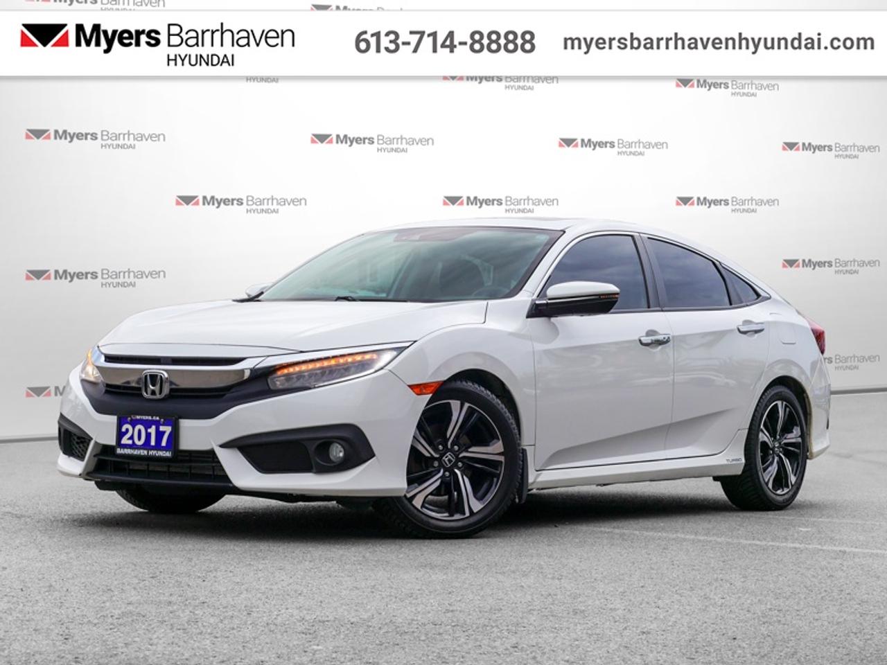 <b>Navigation, Leather Seats, Sunroof, Heated Front and Rear Seats, Bluetooth, Rear View Camera, Blind Spot Detection</b><br> <br>  Compare at $18020 - Our Price is just $17495! <br> <br>The Civic has come a long way, and it keeps getting better. Since 1998, the Civic has been Canadas best-selling car. This 2017 Honda Civic Sedan is for sale today.<br> <br>The stunning exterior and impressive performance of the 2017 Civic are clear examples of its exciting evolution. Its progressive look is perfectly complemented by a sophisticated interior designed with your comfort and safety in mind. With an aggressive stance and sporty, sleek lines, the Civic Sedan looks great from every angle. If youre looking for greatness, weve got a seat for you.<br> <br>This sedan has 129,653 km. Its White in colour. It has an Automatic transmission and is powered by a 174HP 1.5L 4 Cylinder Engine. <br> <br> Our Civic Sedans trim level is Touring. Upgrading to the 2017 Honda Civic Touring sees the addition of larger aluminum wheels, a 452-watt premium audio system, built in navigation, leather heated front and rear seats, wireless bluetooth charging, dual zone climate control, Honda LaneWatch, a power moonroof, proximity key and remote engine start. Youll also get a multi angle rear view camera, Honda Sensing Technologies, bluetooth streaming audio, apple carplay, a 60/40 split rear seat plus much more!<br> <br/>Buy this vehicle now for the lowest bi-weekly payment of <b>$188.94</b> with $1750 down for 48 months @ 9.99% APR O.A.C. ( Plus applicable taxes - & fees ). See dealer for details. <br><br>*LIFETIME ENGINE TRANSMISSION WARRANTY NOT AVAILABLE ON VEHICLES WITH KMS EXCEEDING 140,000KM, VEHICLES 8 YEARS & OLDER, OR HIGHLINE BRAND VEHICLE(eg. BMW, INFINITI. CADILLAC, LEXUS...) o~o