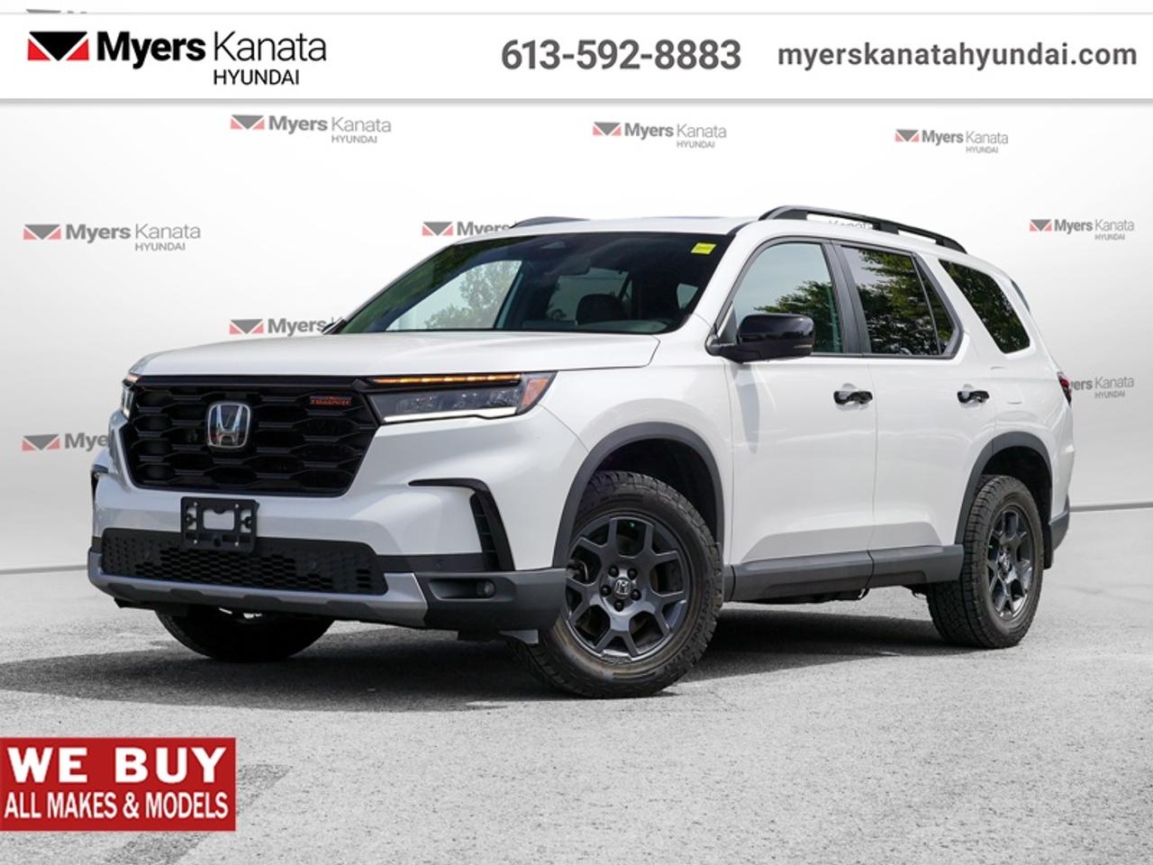 <b>Sunroof,  Remote Start,  Aluminum Wheels,  Heated Seats,  Apple CarPlay!</b><br> <br>  On sale now! This vehicle was originally listed at $54085.  Weve marked it down to $51688. You save $2397.This 2025 Honda Pilot is well-suited for anyone who wants the practicality of a minivan, but with more stylish looks. This 2025 Honda Pilot is for sale today in Kanata.<br> <br>With a highly flexible interior, extremely comfortable ride, and loads of active safety features, this  2025 Honda Pilot should easily be your top choice. The interior of this Honda Pilot surrounds you and your passengers in sophistication thanks to its ergonomic design and soft-touch materials. If your family needs a new driving partner thats steeped in refinement, look no further than this stunning 2025 Honda Pilot.<br> <br>This SUV has 59,420 km. Its nice in colour and is completely accident free based on the <a href=https://vhr.carfax.ca/?id=nefPrLnrGERS/XBxtqWFJ65KB/oCTS/z target=_blank>CARFAX Report</a>. It has an Automatic transmission and is powered by a 285HP 3.5L V6 Cylinder Engine. <br> <br> Our Pilots trim level is TrailSport. Made for the adventure seekers, this Pilot TrailSport comes prepped with all-terrain wheels with a full-size, underbody-stored spare, two skid plates for underbody protection, a tow hitch, front and rear tow hooks, and exclusive exterior styling. Other standard features include and express open/close glass sunroof, heated front seats with power adjustment, lumbar support and memory function, heated second row captains chairs, TrailSport leatherette seating surfaces, remote engine start, a heated steering wheel, and adaptive cruise control. Safety on the road is assured, thanks to HondaLink Assist Emergency SOS, blind spot detection, collision mitigation braking system with forward collision warning and rear cross traffic alert, lane keeping assist with lane departure warning, and front and rear parking sensors. Additional features include a power liftgate, Apple CarPlay, Android Auto, dual-zone climate control with rear vents and separate controls, and even more. This vehicle has been upgraded with the following features: Sunroof, Remote Start, Aluminum Wheels, Heated Seats, Apple CarPlay, Android Auto, Power Liftgate.<br> <br>To apply right now for financing use this link: <a href=https://www.myerskanatahyundai.com/finance/ target=_blank>https://www.myerskanatahyundai.com/finance/</a><br> <br/><br>Smart buyers buy at Myers where all cars come Myers Certified including a 1 year tire and road hazard warranty (some conditions apply, see dealer for full details.)<br> <br>This vehicle is located at Myers Kanata Hyundai 400-2500 Palladium Dr Kanata, Ontario.<br>*LIFETIME ENGINE TRANSMISSION WARRANTY NOT AVAILABLE ON VEHICLES WITH KMS EXCEEDING 140,000KM, VEHICLES 8 YEARS & OLDER, OR HIGHLINE BRAND VEHICLE(eg. BMW, INFINITI. CADILLAC, LEXUS...)<br> Come by and check out our fleet of 30+ used cars and trucks and 170+ new cars and trucks for sale in Kanata.  o~o