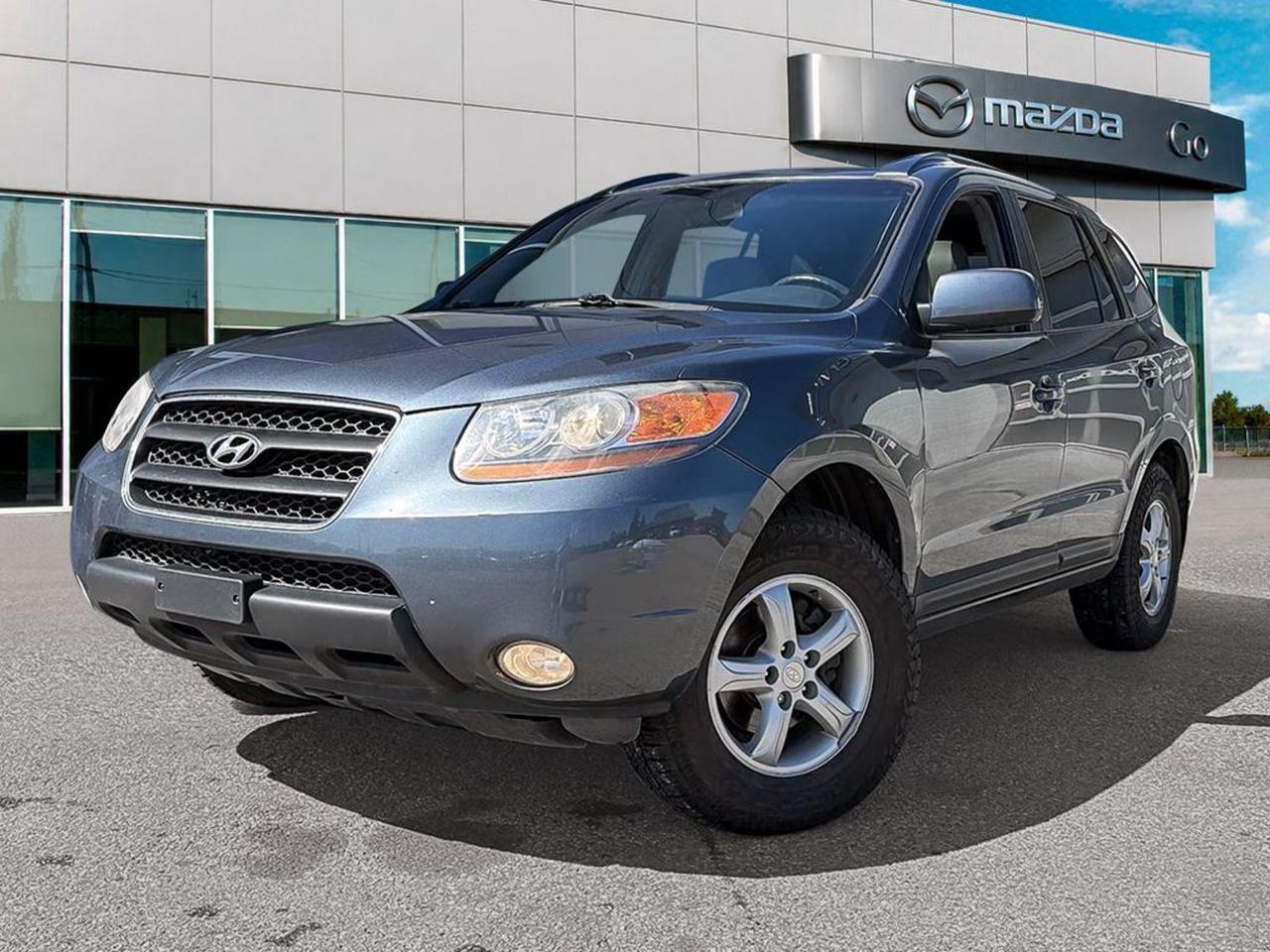 Experience reliability and versatility with this pre-owned 2008 Hyundai Santa Fe GLS 5-Pass AWD. Featuring a robust 3.3L V-6 engine paired with a smooth 5-speed automatic transmission and full-time all-wheel drive, this SUV is ready to tackle all your driving adventures.Enjoy comfort with multi-adjustable heated leather front captain chairs, spacious 5-passenger seating, and a well-appointed interior highlighted by simulated wood and metal-look accents. Stay entertained on the road with AM/FM/CD/MP3 and XM satellite radio, plus steering wheel-mounted audio controls.Safety is paramount with six airbags, electronic stability control, ABS brakes, and traction control. The exterior shines in Silver with 16 alloy wheels, projector beam headlights, heated power mirrors, and roof rails for added utility.This Santa Fe offers practical features like power windows, cruise control, keyless entry, and ample cargo space with fold-flat rear seats. With a solid mix of comfort, capability, and safety, this 2008 Hyundai Santa Fe GLS AWD is a great choice for your next SUV. Contact us today to schedule a test drive!