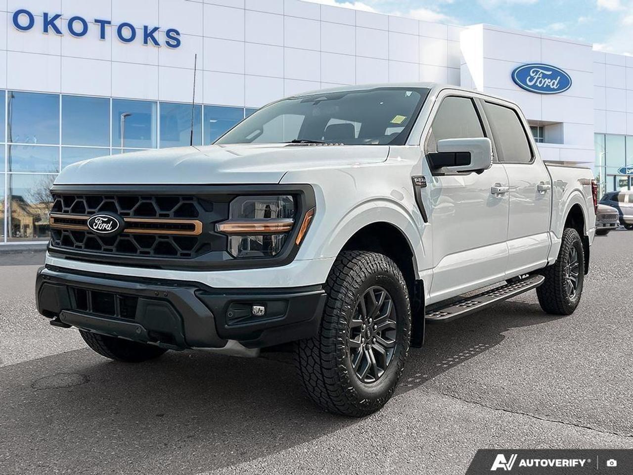 <p><strong>2024 Ford F-150 Tremor: Ready for Alberta Terrain</strong></p><p>Experience the perfect balance of rugged capability and premium comfort with this one-owner, Alberta-driven 2024 Ford F-150 Tremor. With 90,828 km on the odometer, this truck is fully prepped and ready for your next adventure. We have invested in significant maintenance to ensure it meets our elite standards, including the installation of a brand-new set of tires and a fresh windshield.</p><p><strong>Immediate Added Value</strong></p><ul><li><p><strong>New Rubber:</strong>Drive away with confidence knowing this truck is equipped with a fresh set of tires.</p></li><li><p><strong>Protection & Utility:</strong>Protect your investment with high-quality 3M paint protection film and a durable spray-in bed liner, already installed.</p></li><li><p><strong>Ready to Work/Play:</strong>Features the Mobile Office Package, wireless charging, and the Bed Utility Package to maximize productivity.</p></li></ul><p><strong>Vehicle History Highlights</strong></p><ul><li><p><strong>One Owner:</strong>Meticulously maintained and driven locally in Alberta.</p></li><li><p><strong>Clean History:</strong>This unit has a clean CarFax report with no reported accidents or damage.</p></li><li><p><strong>Consistent Care:</strong>Excellent service history exclusively at Ford dealerships.</p></li></ul><p><strong>The Alberta "X-Factor"</strong></p><p>Built for our climate, this Tremor comes equipped to handle everything the province throws its way:</p><ul><li><p><strong>All-Terrain Mastery:</strong>Features the 3.5L V6 EcoBoost engine, 4WD system with a Torsen front differential, and skid plates for superior off-road capability.</p></li><li><p><strong>Comfort & Convenience:</strong>Stay warm with a heated steering wheel and dual-zone climate control and enjoy the convenience of remote start and the twin-panel moonroof.</p></li></ul><p><strong>The Okotoks Ford Trust Advantage</strong></p><p>Transparency is our priority. This vehicle has successfully completed a rigorous <strong>AMVIC Mechanical Fitness Assessment</strong>. Furthermore, because it falls within our high-quality standards, it has passed our comprehensive <strong>Tricare Warranty Inspection</strong>, a level of mechanical scrutiny that goes far beyond the standard legal requirement to offer you total peace of mind.</p><p><strong>Take the Next Step</strong></p><p>This F-150 is ready for immediate delivery. Contact our team today to:</p><ul><li><p>Request a custom smartphone video walkaround highlighting the features you care about most.</p></li><li><p>Submit your current vehicle details (Year, Make, Model, Mileage) for an instant trade-in estimate.</p></li><li><p>Request a secure link for quick, stress-free online credit pre-approval.</p></li></ul><p>Okotoks Ford Lincoln is an AMVIC licensed dealership. Vehicle available at time of publication. Price excludes GST & fees. Contact dealer for more information.</p>