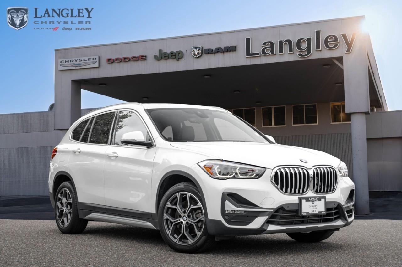 <p><strong>2021 BMW X1 xDrive28i</strong></p><p>The 2021 BMW X1 xDrive28i is a nimble and practical subcompact luxury SUV that offers a spirited driving experience and a spacious, cargo-friendly cabin.</p><ul><li><p>Horsepower: 228 hp</p></li><li><p>Torque: 258 lb-ft</p></li><li><p>Drivetrain: xDrive All-Wheel Drive</p></li><li><p>Transmission: 8-Speed Automatic</p></li><li><p>0-60 MPH: 6.3 seconds</p></li></ul><p>Come book a test drive at Langley Chrysler, conveniently located in Langley, British Columbia.</p>

<p>*All prices plus applicable taxes, applicable environmental recovery charges, documentation of $599 and full tank of fuel surcharge of $76 if a full tank is chosen. <br />Other protection items available that are not included in the above price:<br />Tire & Rim Protection and Key fob insurance starting from $599<br />Service contracts (extended warranties) for coverage up to 7 years and 200,000 kms starting from $599<br />Custom vehicle accessory packages, mudflaps and deflectors, tire and rim packages, lift kits, exhaust kits and tonneau covers, canopies and much more that can be added to your payment at time of purchase<br />Undercoating, rust modules, and full protection packages starting from $199<br />Financing Fee of $500 when applicable<br />Flexible life, disability and critical illness insurances to protect portions of or the entire length of vehicle loan</p>