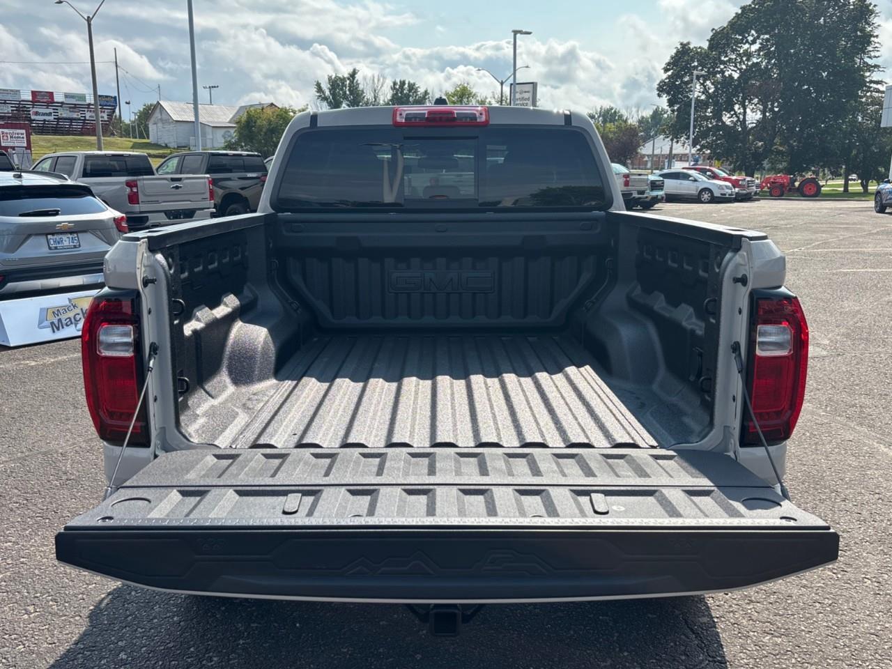 2026 GMC Canyon AT4 New 5 Passenger Mid Size 4X4 Crew Cab Truck with Heated Front Seats and a 11 Diagonal Touchscreen Radio with Google Built-In and Wireless Apple CarPlay, Wireless Android Auto Photo