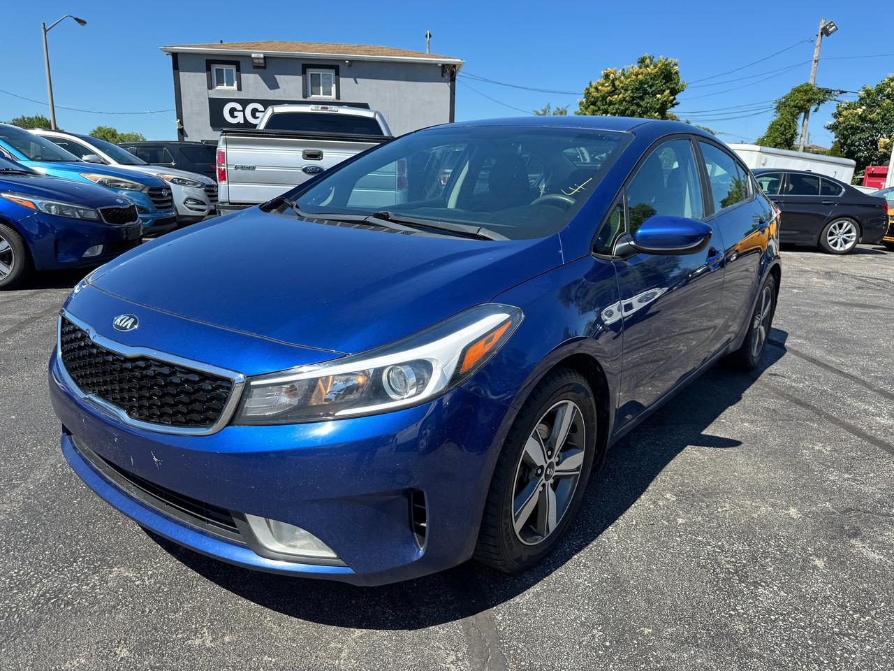 <p class=p1>✅ Certified | <span class=s2><strong>2018 Kia Forte LX+ | No Accidents</strong></span></p><p class=p2>&nbsp;</p><p class=p2>This Certified 2018 Kia Forte LX+ is a reliable, fuel-efficient sedan offering modern features, a comfortable ride, and a <span class=s2><strong>clean accident-free history</strong></span> &mdash; perfect for commuting or everyday driving.</p><p class=p2>&nbsp;</p><p class=p2>🔹 <span class=s2><strong>2.0L 4-Cylinder Engine</strong></span><br>🔹 Automatic Transmission<br>🔹 Front-Wheel Drive (FWD)<br>🔹 <span class=s2><strong>No Accidents</strong></span><br>🔹 <span class=s2><strong>LX+ Trim &mdash; Well Equipped</strong></span><br>🔹 Backup Camera<br>🔹 Bluetooth &ndash; Hands-Free Calling & Audio Streaming<br>🔹 Touchscreen Display<br>🔹 Apple CarPlay & Android Auto<br>🔹 Heated Front Seats<br>🔹 Heated Steering Wheel<br>🔹 Cruise Control<br>🔹 Steering Wheel Audio & Cruise Controls<br>🔹 Air Conditioning<br>🔹 Power Windows, Locks & Mirrors<br>🔹 Keyless Entry<br>🔹 Alloy Wheels<br>🔹 Traction Control & ABS<br>🔹 Spacious Trunk<br>🔹 Excellent Fuel Economy<br>🔹 Runs and Drives Excellent</p><p class=p2>&nbsp;</p><p class=p2>📍 Visit Us:<br>74 Parkdale Avenue North, Hamilton, Ontario</p><p class=p2>&nbsp;</p><p class=p2>📞 Call or Text:<br>(905) 975-9705 / (905) 462-5542</p><p class=p2>&nbsp;</p><p class=p2>📧 Email:<br>gusmarkos@gmail.com</p><p class=p2>&nbsp;</p><p class=p2>🗓️ Test Drives by Appointment Only &mdash; Book Yours Today</p><p class=p2>&nbsp;</p><p class=p2>🛡️ Buy With Confidence &mdash; OMVIC Licensed Dealership<br>✔️ CARFAX VERIFIED &mdash; Full History & Lien-Free<br>✔️ No Hidden Fees &mdash; Just Price + HST + Licensing<br>✔️ Trade-Ins Welcome &mdash; Top Dollar for Your Vehicle<br>✔️ Don&rsquo;t See What You Want? We&rsquo;ll Find It for You</p><p class=p2>&nbsp;</p><p class=p2>💻 100% Online Purchase Available &mdash; Financing & Delivery Options<br>🚗 Ontario-Wide Delivery Available<br>✈️ Ask About Our Customer Travel Program</p>