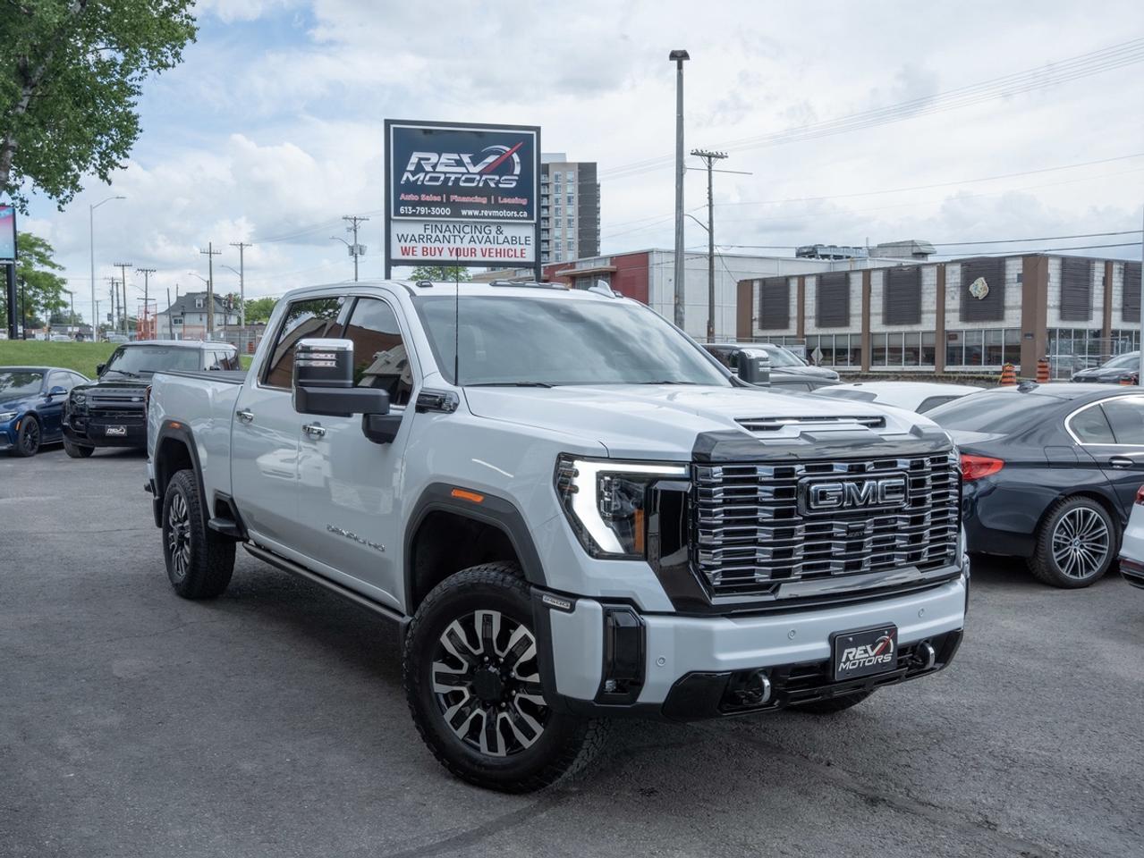 2026 GMC Sierra 2500HD Denali Ultimate | Duramax 6.6L Turbo Diesel | Preferred Equipment Group | Gooseneck / 5th Wheel Prep<br/> <br/> Ask us about our leasing options!! <br/> <br/> <br/> Glacier White Exterior | Alpine Umber Leather Interior | 6.6L Duramax Turbo‑Diesel V8 Engine | Advanced Biodiesel Compatibility | 470 Horsepower / 975 lb‑ft Torque | Allison 10‑Speed Automatic Transmission | 4x4 Four‑Wheel Drive | Heavy‑Duty Trailering Package | Adaptive Ride Control | MultiPro Tailgate | LED Lighting System | Power Sunroof | Heated & Ventilated Front Seats | Heated Rear Seats | Heated Steering Wheel | Dual‑Zone Climate Control | Open‑Pore Wood Trim | Premium Ambient Lighting | Bose Premium Sound System | 13.4‑Inch Touchscreen Display | Digital Driver Display | Navigation System | Wireless Apple CarPlay & Android Auto | Head‑Up Display | Surround Vision Camera | Blind Zone Alert | Rear Cross‑Traffic Alert | Adaptive Cruise Control | Lane Keep Assist | Front & Rear Park Assist | Power Running Boards | Keyless Entry | Remote Start | and much much more <br/> <br/> <br/> Features Include: <br/> Duramax 6.6L Turbo Diesel | Allison 10‑Speed Automatic | 4x4 Drive System | MultiPro Tailgate | Adaptive Ride Control | Bose Premium Audio | 13.4” Touchscreen | Digital Driver Display | Heated & Ventilated Seats | Heated Steering Wheel | Surround Vision Camera | Trailer Brake Controller | Integrated Trailer Tech | Power Running Boards | Wireless Smartphone Integration <br/> <br/> <br/> The 2026 GMC Sierra 2500HD Denali Ultimate delivers unmatched heavy‑duty capability, premium luxury, and advanced technology in a top-tier diesel pickup. <br/> <br/> <br/> Key Features <br/> <br/> <br/> Bold & Commanding Design <br/> Finished in crisp white, the Denali Ultimate stands out with its signature chrome Denali grille, LED lighting, and aggressive heavy‑duty stance. Premium finishes and strong body lines emphasize both luxury and capability. <br/> <br/> <br/> Ultra‑Premium Interior <br/> Inside, the black full‑grain leather interior offers one of the most luxurious cabins in its class. Heated and ventilated front seats, open‑pore wood trim, and premium materials elevate the driving experience to a new level of refinement. <br/> <br/> <br/> Advanced GMC Technology <br/> The Sierra features a large 13.4‑inch touchscreen infotainment system paired with a fully digital driver display. Navigation, wireless Apple CarPlay & Android Auto, and voice control ensure seamless connectivity, while the head‑up display keeps key information front and center. <br/> <br/> <br/> Duramax Diesel Power <br/> At its core is the 6.6L Duramax turbo‑diesel V8, delivering massive torque for towing and hauling. Paired with the Allison 10‑speed automatic transmission and 4x4 system, the Sierra provides smooth, powerful performance in all conditions. <br/> <br/> <br/> Heavy‑Duty Capability <br/> Built for serious work, the Sierra 2500HD includes advanced trailering technology, integrated trailer brake controls, and a robust chassis designed for towing and hauling with confidence. <br/> <br/> <br/> Advanced Safety & Driver Assistance <br/> Equipped with modern safety features, including: <br/> • Adaptive Cruise Control <br/> • Blind Zone Alert <br/> • Lane Keep Assist <br/> • Surround Vision Camera <br/> • Rear Cross‑Traffic Alert <br/> • Front & Rear Parking Assist <br/> <br/> <br/> Luxury Without Compromise <br/> From its power running boards and panoramic features to premium audio and advanced towing tech, the Denali Ultimate delivers a perfect blend of work capability and high-end comfort. <br/> <br/> <br/> The 2026 GMC Sierra 2500HD Denali Ultimate Duramax is more than a truck—it’s a statement of strength, luxury, and uncompromising performance. <br/> <br/> <br/> This vehicle has travelled 1166 Kms. <br/> <br/> <br/> <br/> <br/> *** NO additional fees except for taxes and licensing! *** <br/> <br/> <br/> *** 100-point inspection on all our vehicles & always detailed inside and out *** <br/> <br/> <br/> RevMotors is at your service to ensure you find the right car for YOU. Even if we do not have it in our inventory, we are more than happy to find you the vehicle that you are looking for. Give us a call at 613-791-3000 or visit us online at www.revmotors.ca <br/> <br/> <br/> Ça nous donnera du plaisir de vous servir en Français aussi! <br/> <br/> <br/> CERTIFICATION * All our vehicles are sold Certified for the province of Ontario (Quebec Safety Available, additional charges may apply) <br/> FINANCING AVAILABLE * RevMotors offers competitive finance rates through many of the major banks. Should you feel like youve had credit issues in the past, we have various financing solutions to get you on the road. We accept No Credit - New Credit - Bad Credit - Bankruptcy - Students and more!! Please keep in mind the default loan structure found on the vehicle page is a template. The exact rate and terms that a vehicle qualifies for may differ. All quotes are subject to lender approval. <br/> EXTENDED WARRANTY * For your peace of mind, if one of our used vehicles is no longer covered under the manufacturer’s warranty, RevMotors will provide you with a 6 month / 6000KMS Limited Powertrain Warranty. You always have the options to upgrade to more comprehensive coverage as well. Well be more than happy to review the options and chose the coverage thats right for you! <br/> TRADES * Do you have a Trade-in? We offer competitive trade in offers for your current vehicle! <br/> SHIPPING * We can ship anywhere across Canada. Give us a call for a quote and we will be happy to help! <br/> <br/> <br/> Buy with confidence knowing that we always have your best interests in mind! <br/>